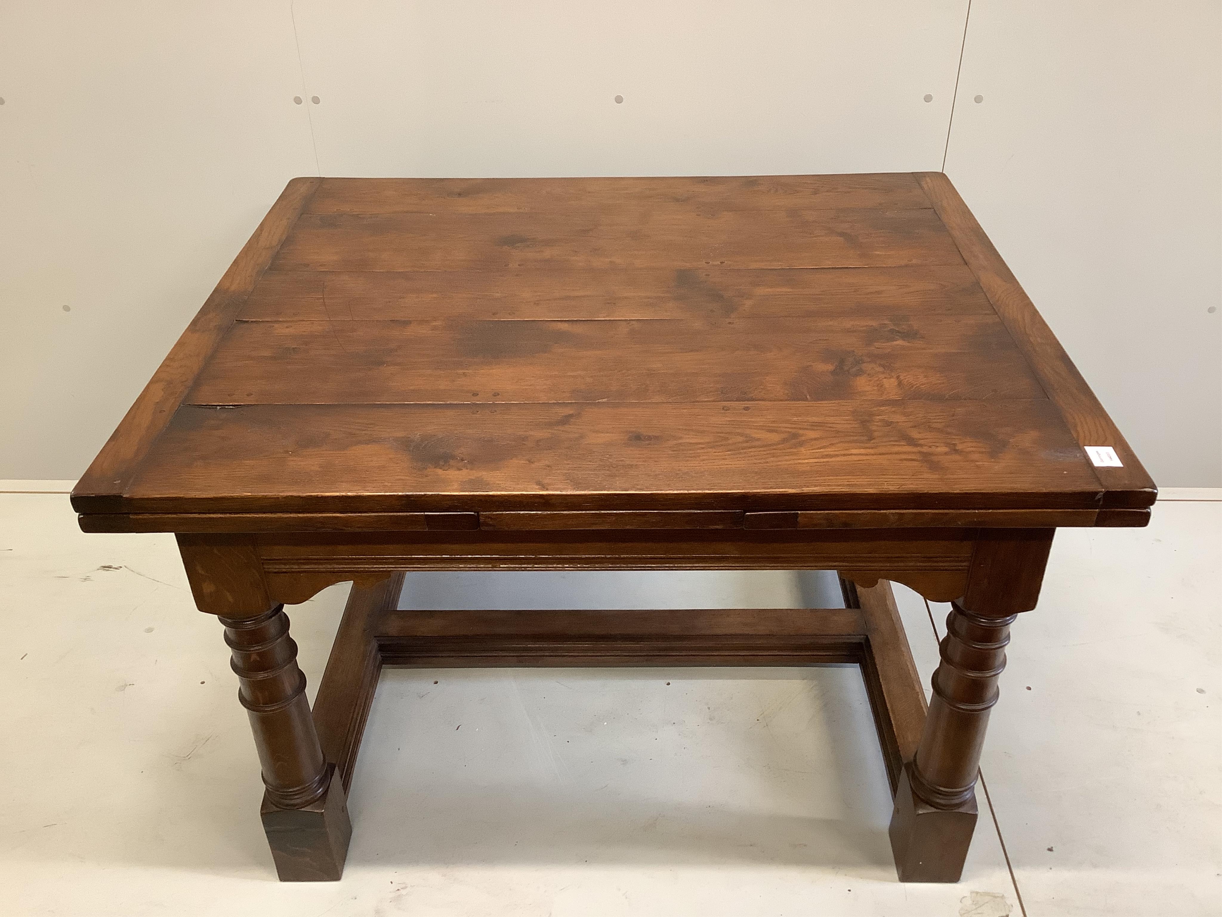 An 18th century style rectangular oak draw leaf refectory dining table, width 121cm, 210cm extended, depth 101cm, height 78cm. Condition - good                                                                             
