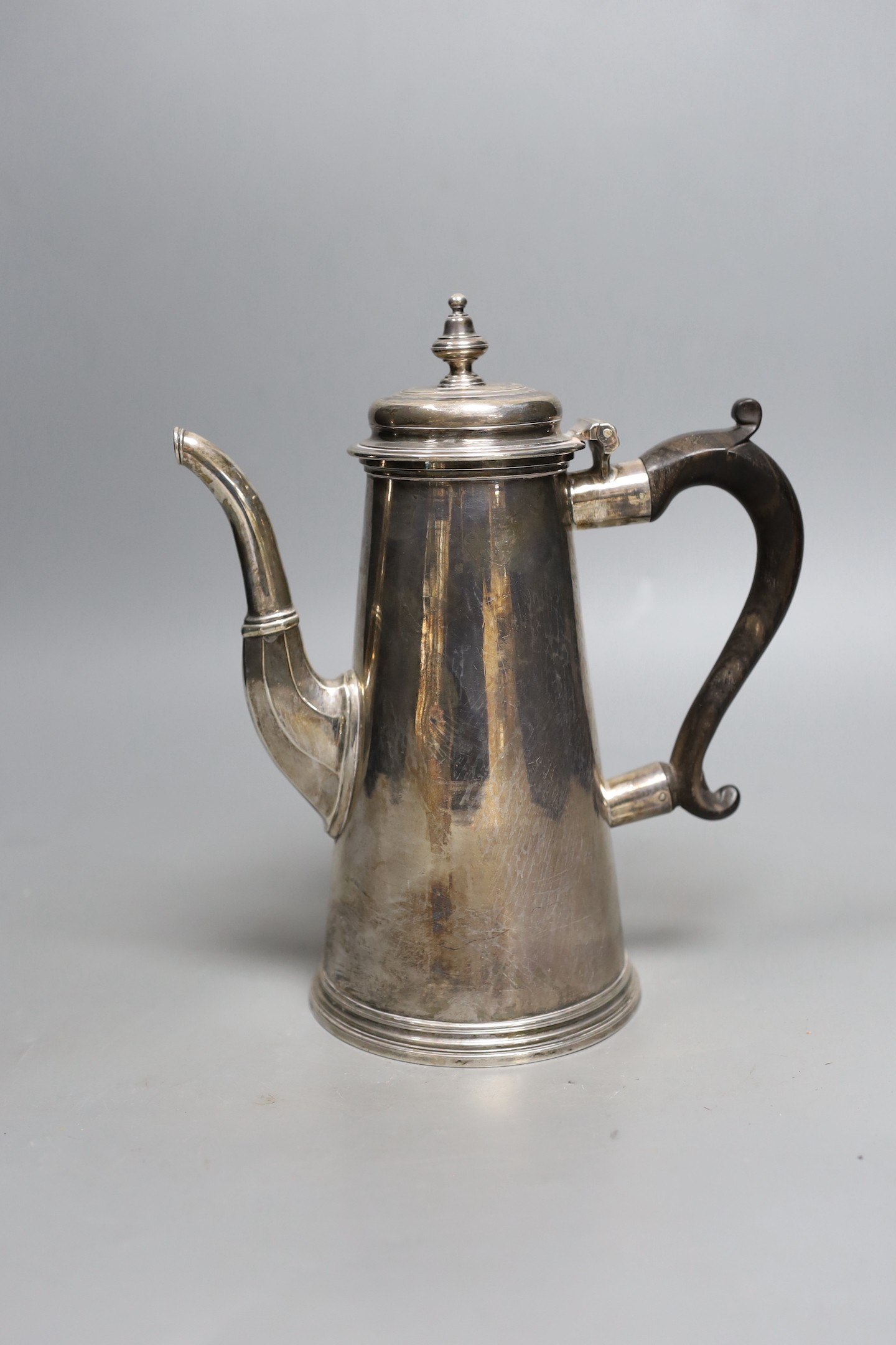 A George II silver coffee pot, Thomas Farren, London, 1730, 24cm, 28.8oz.                                                                                                                                                   