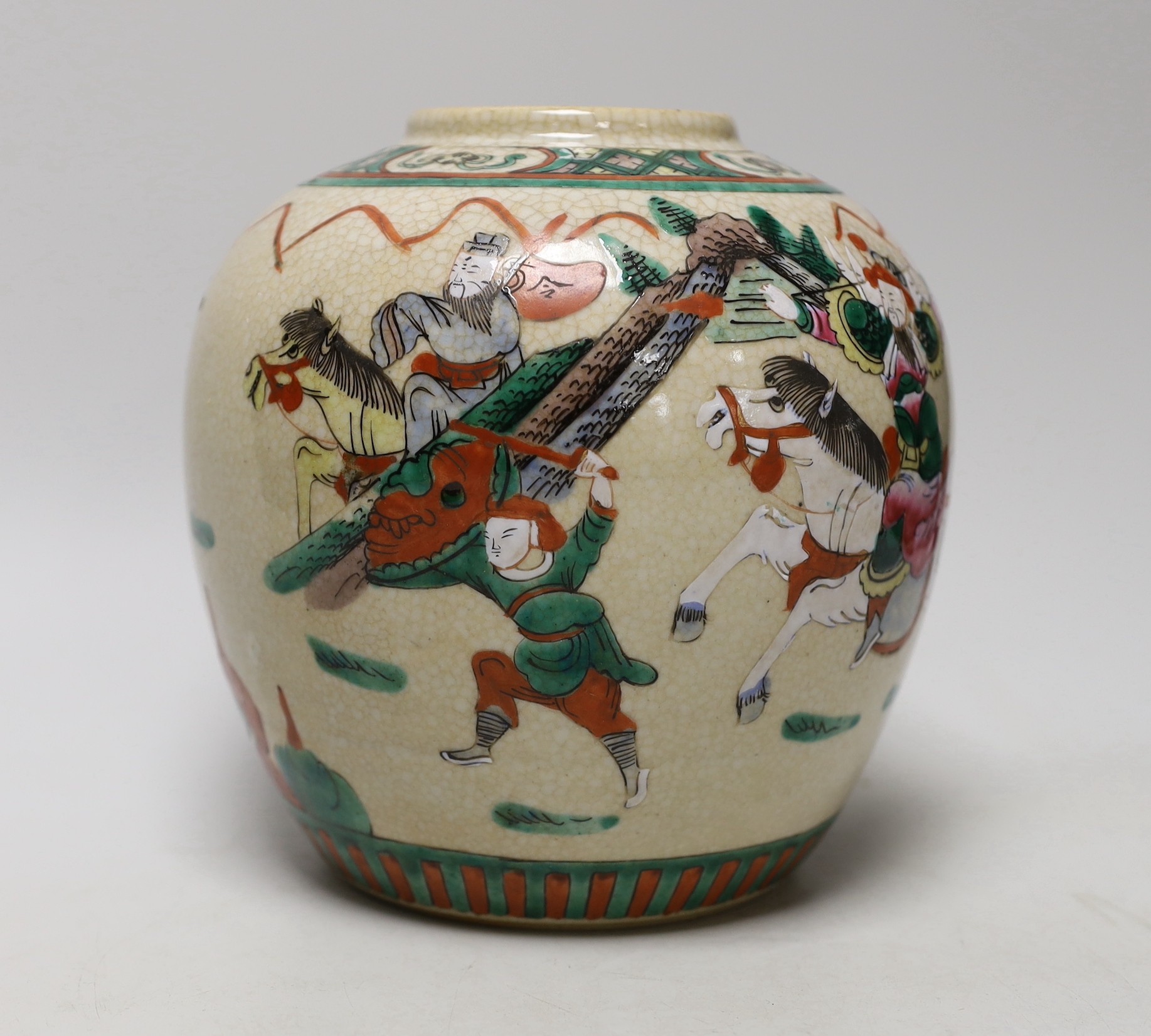 An early 20th century Chinese famille rose crackle glaze ginger jar, decorated with warrior scenes, 18cm high                                                                                                               