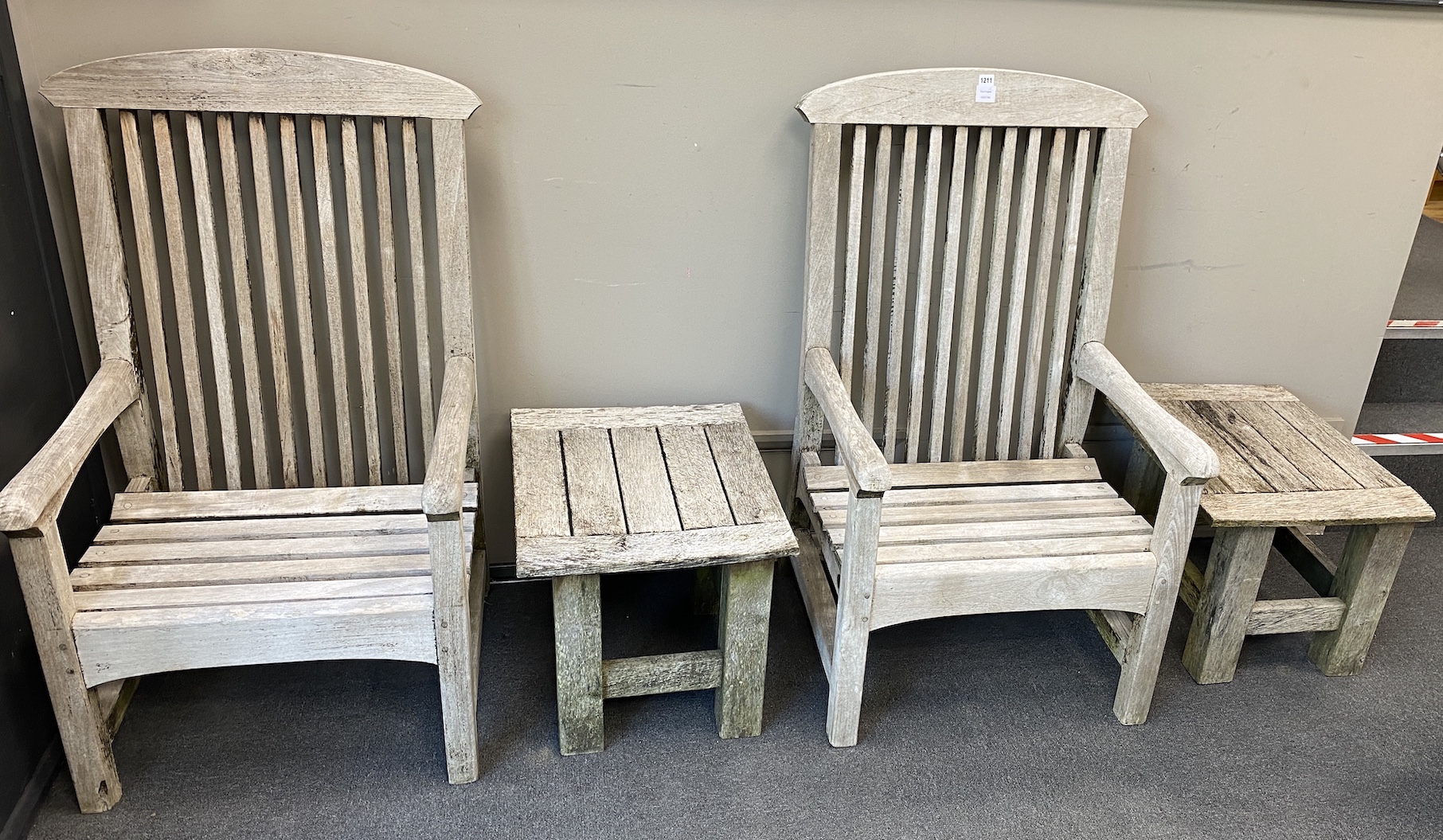 Two high backed slatted teak garden chairs, width 68cm, depth 70cm, height 121cm and a pair of small teak square topped tables                                                                                              