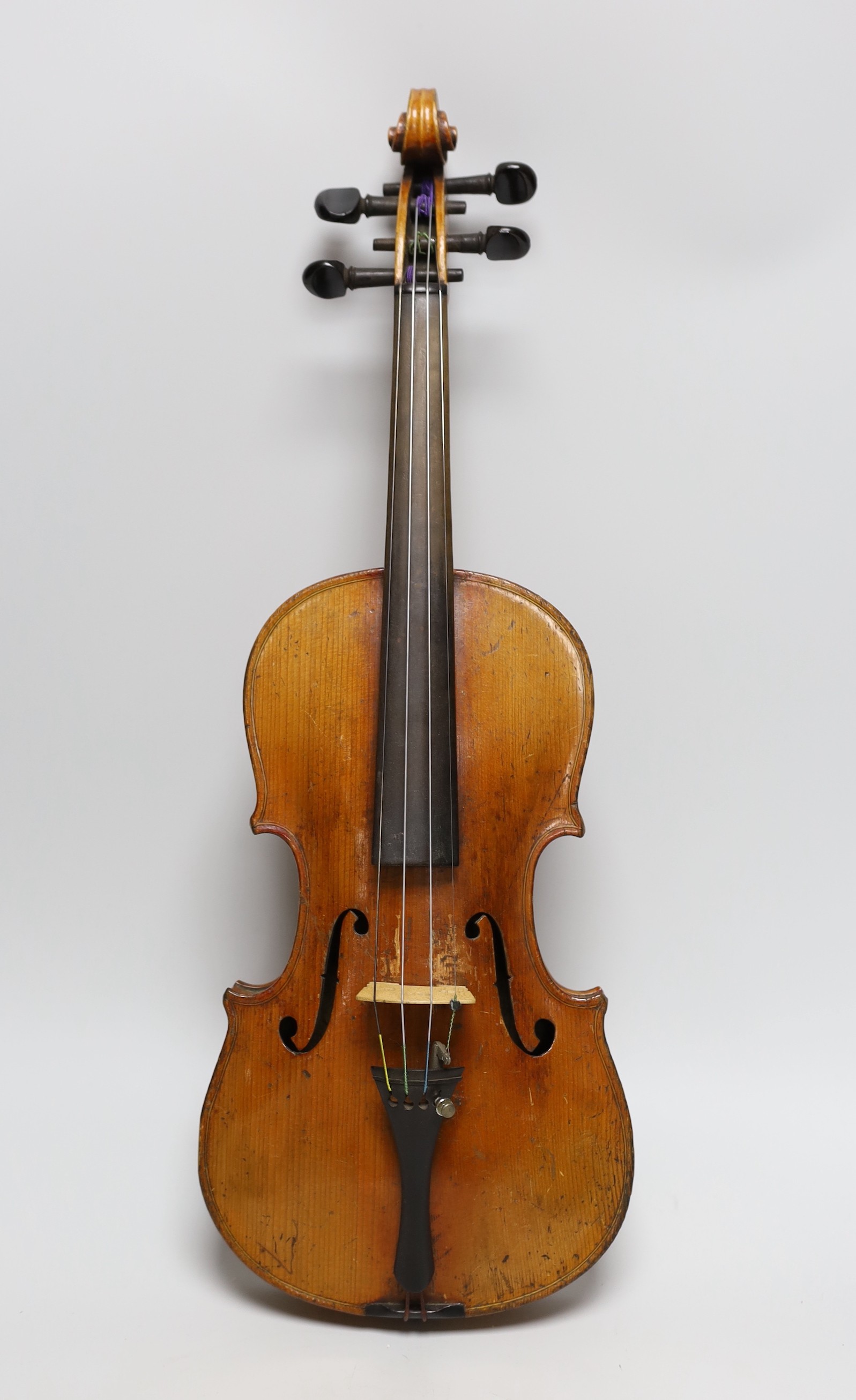 A 19th century German violin, back measures 33cm, cased                                                                                                                                                                     