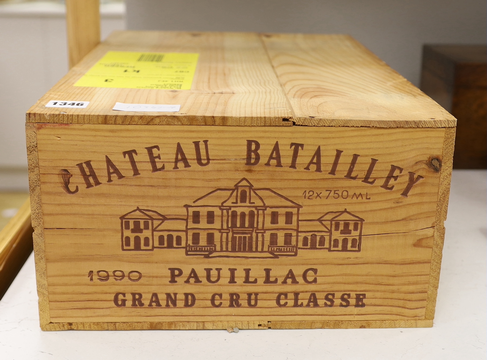 Twelve bottles of Chateau Batailley, 1990, in OWC, purchased from The Wine Society.                                                                                                                                         