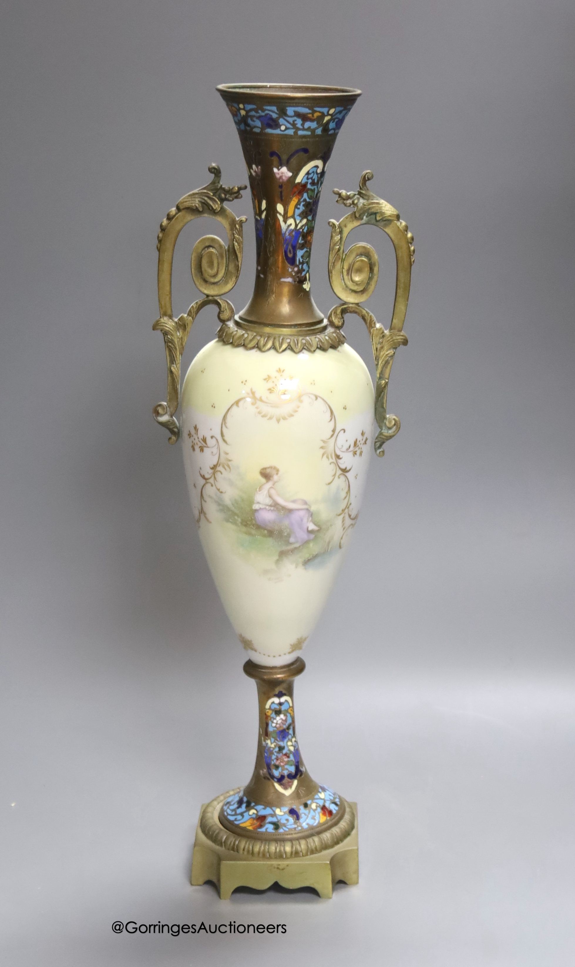 A French or Bohemian ormolu-mounted champlevé-enamel and porcelain vase, indistinctly signed by painter, height 40cm                                                                                                        