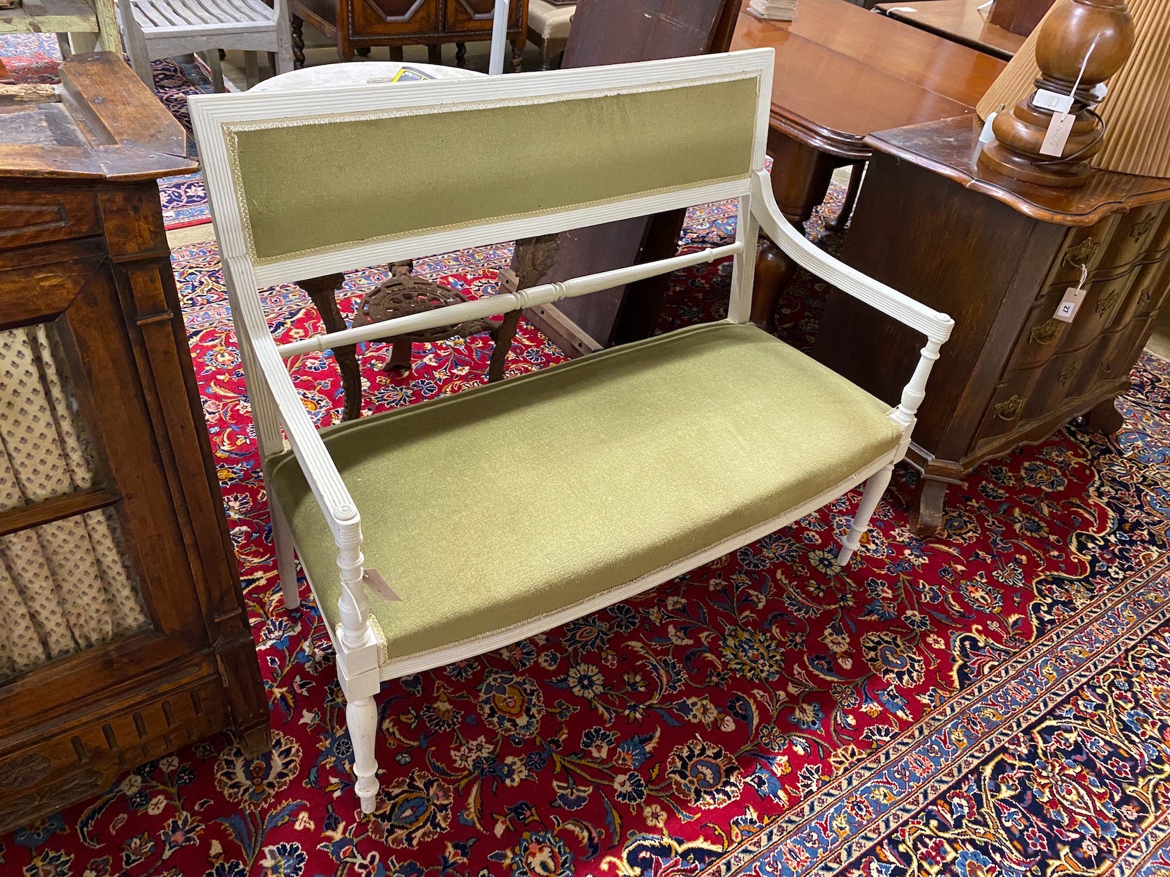 A late 19th century French upholstered painted settee, length 104cm, depth 48cm, height 90cm                                                                                                                                