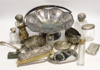 Small silver items including a pair of silver mounted cut glass scent bottles small bowl, toilet jars, mirror, brushes, cigarette case, stamp case, cream jug etc. and two plated items.                                    