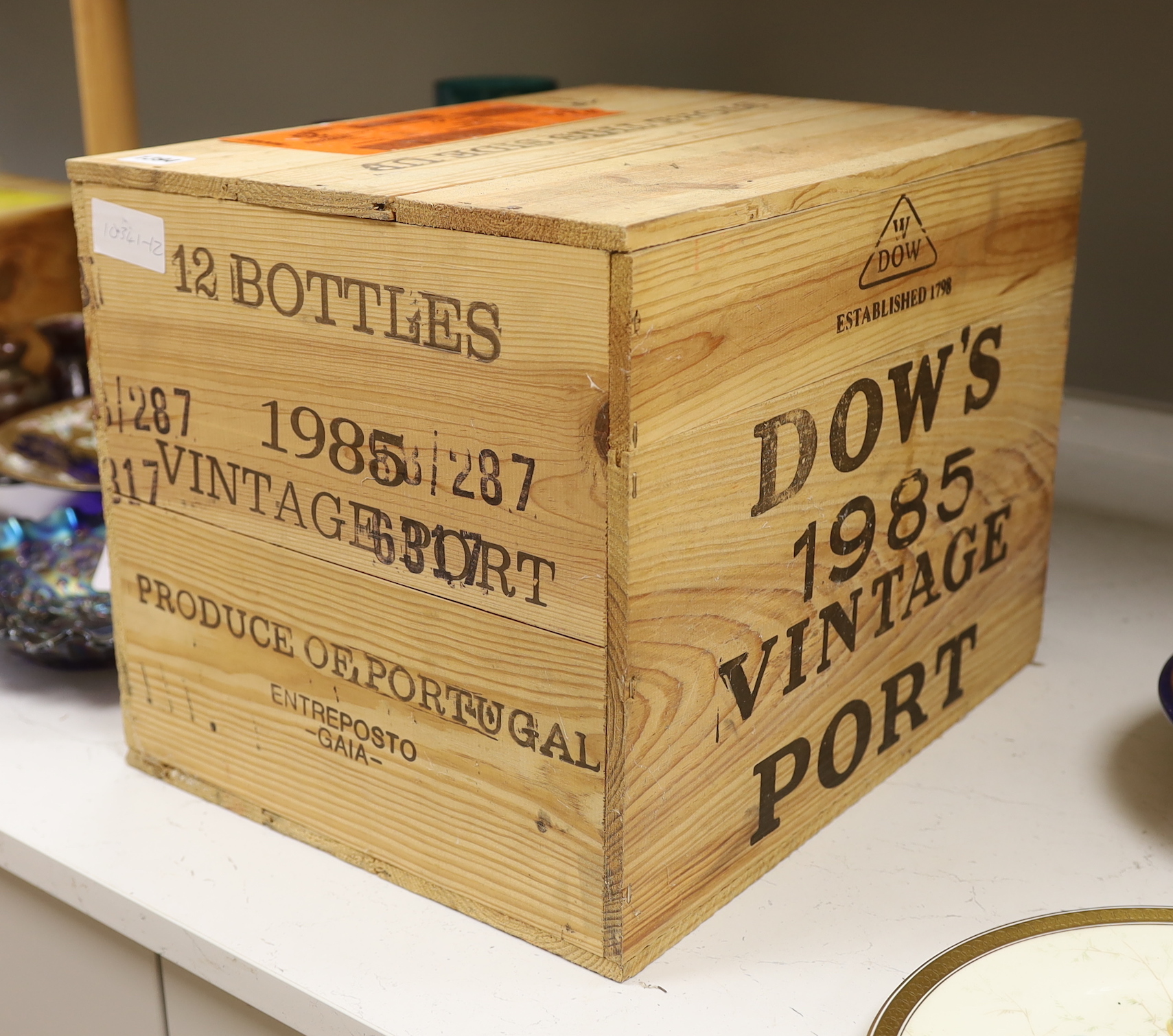 Twelve bottles of Dows Vintage Port, 1985, in OWC, purchased from The Wine Society.                                                                                                                                         
