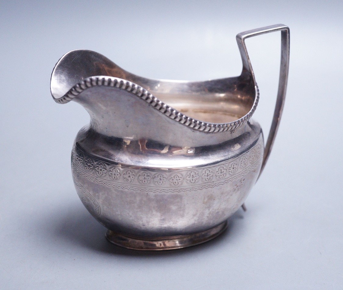 A George III silver cream jug, Thomas Law, Sheffield, 1808, height 9.8cm, 122 grams.                                                                                                                                        