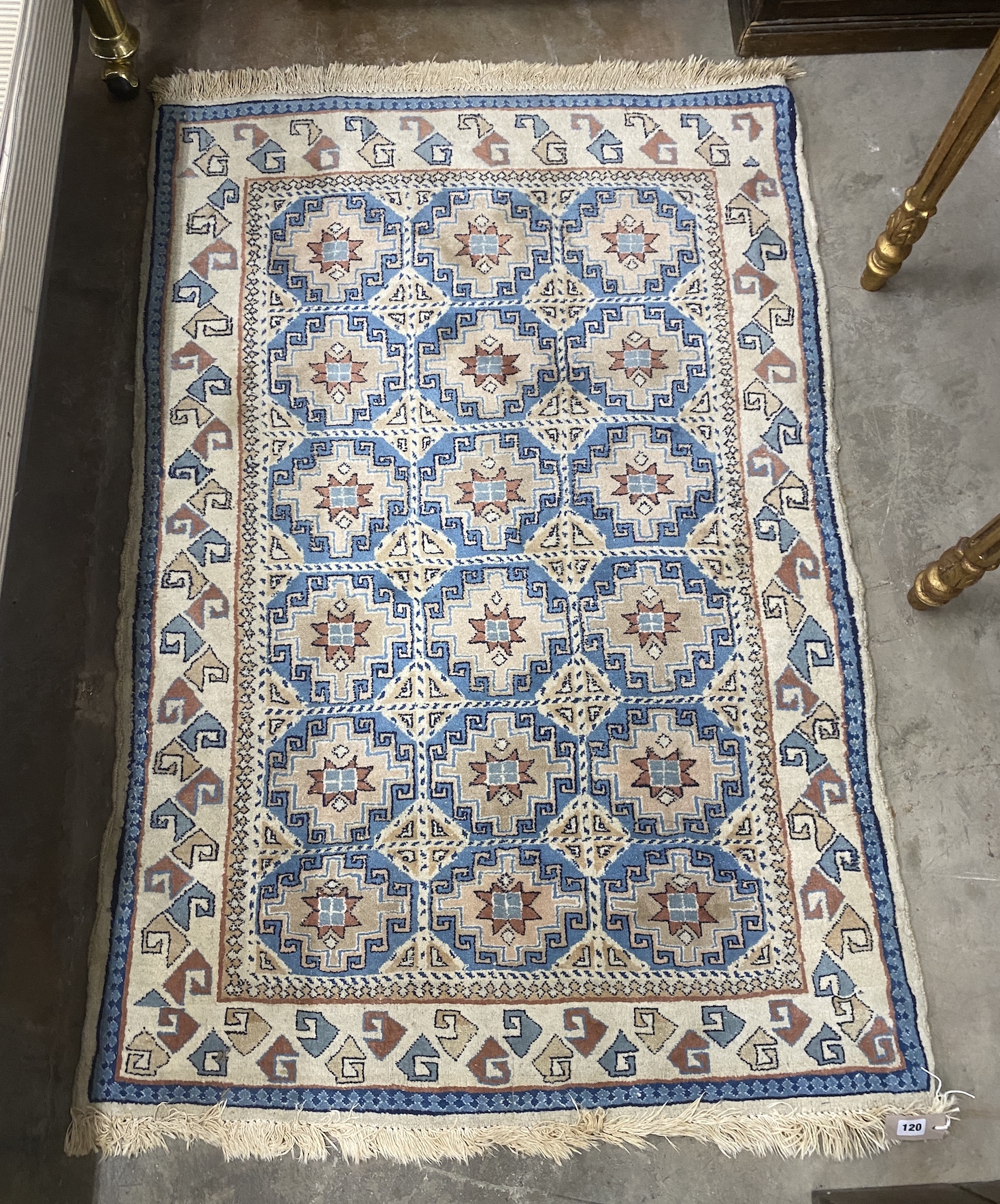 A Caucasian blue ground rug, 142 x 98cm                                                                                                                                                                                     