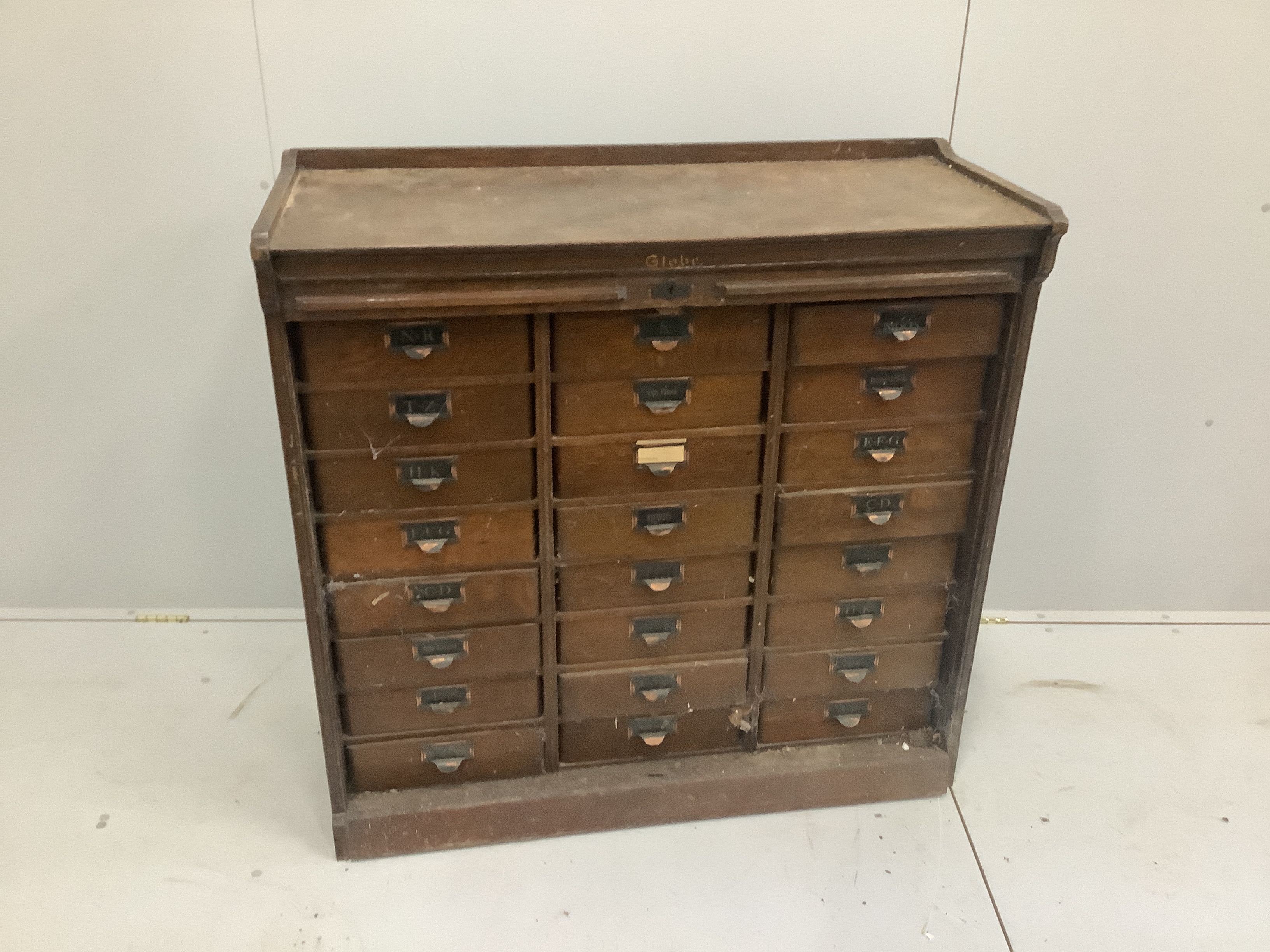 An early 20th century oak Globe Wernicke office filing cabinet with tambour front, width 106cm, height 104cm                                                                                                                