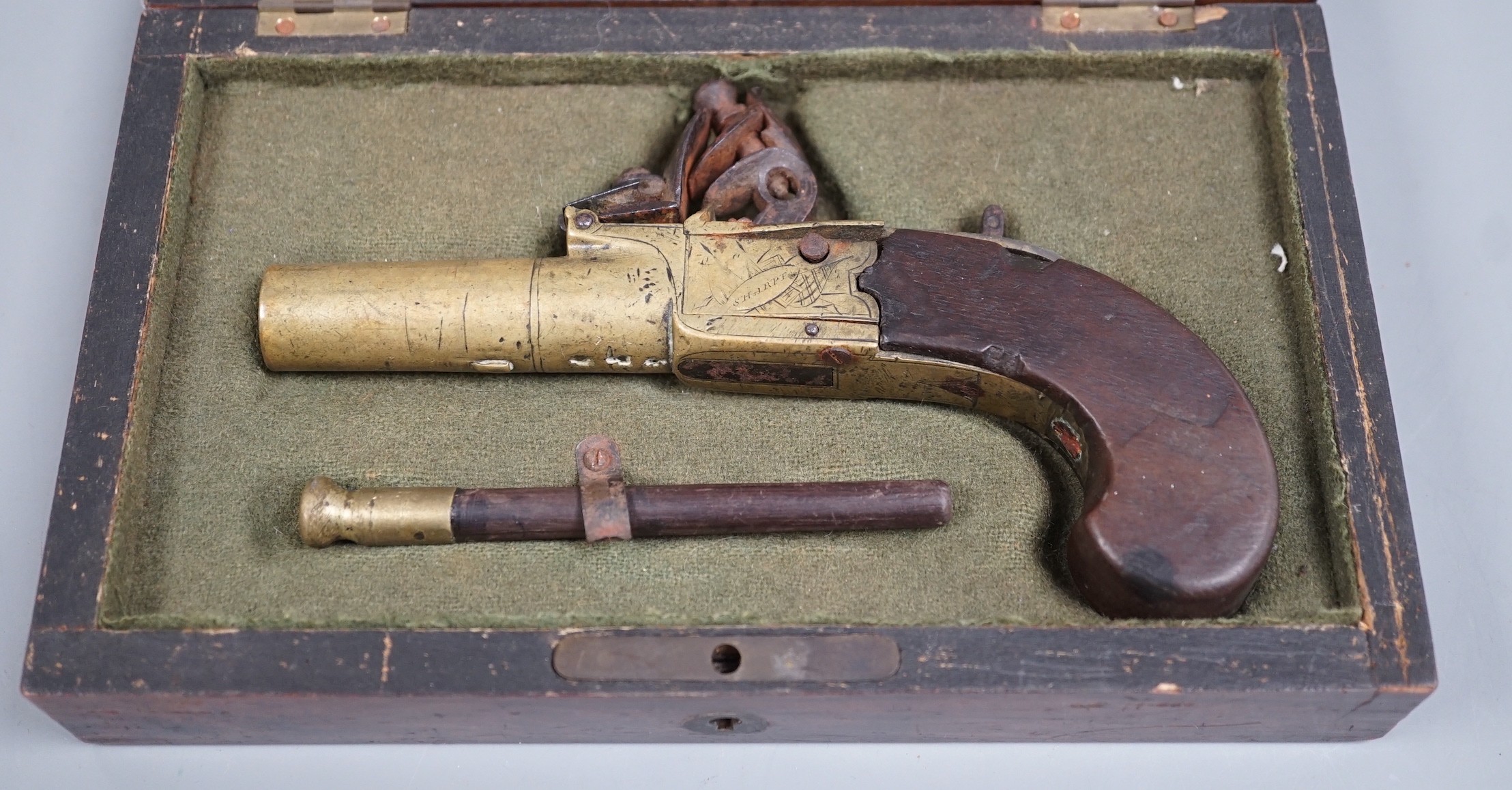 A George III flintlock pocket pistol by Sharpe, London, in a later fitted rosewood case                                                                                                                                     