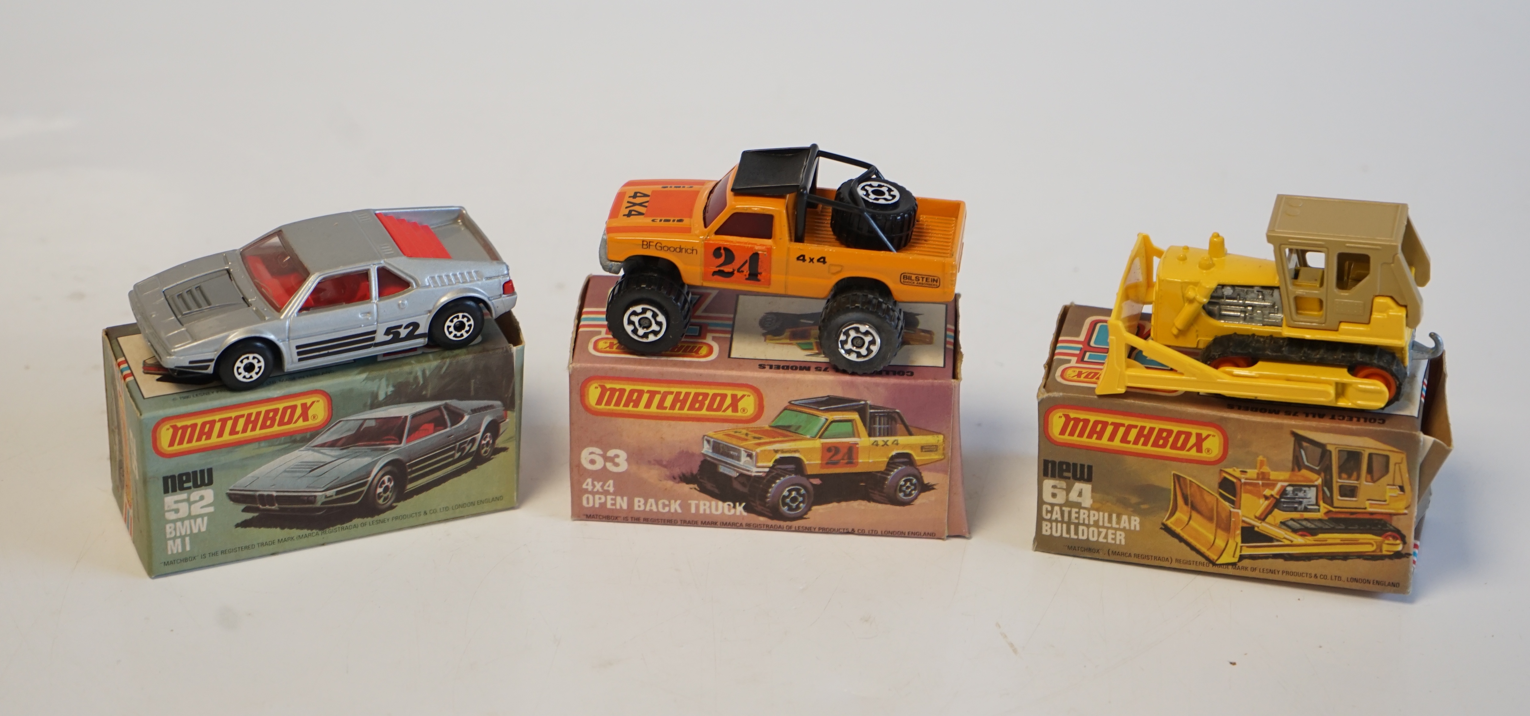 Eighteen boxed Matchbox Series 1-75 diecast vehicles including; 1; Dodge Challenger and another, 9; Ford RS 2000 and another, 10; Plymouth Police Car and another, 14; Petrol Tanker and another, 26; Site Dumper, 28; Formu