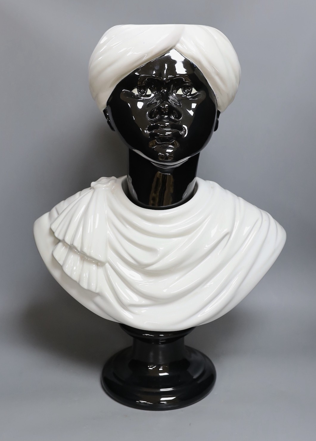 Attributed to Piero Fornasetti, a large ceramic bust of a Moor. 60cm tall                                                                                                                                                   
