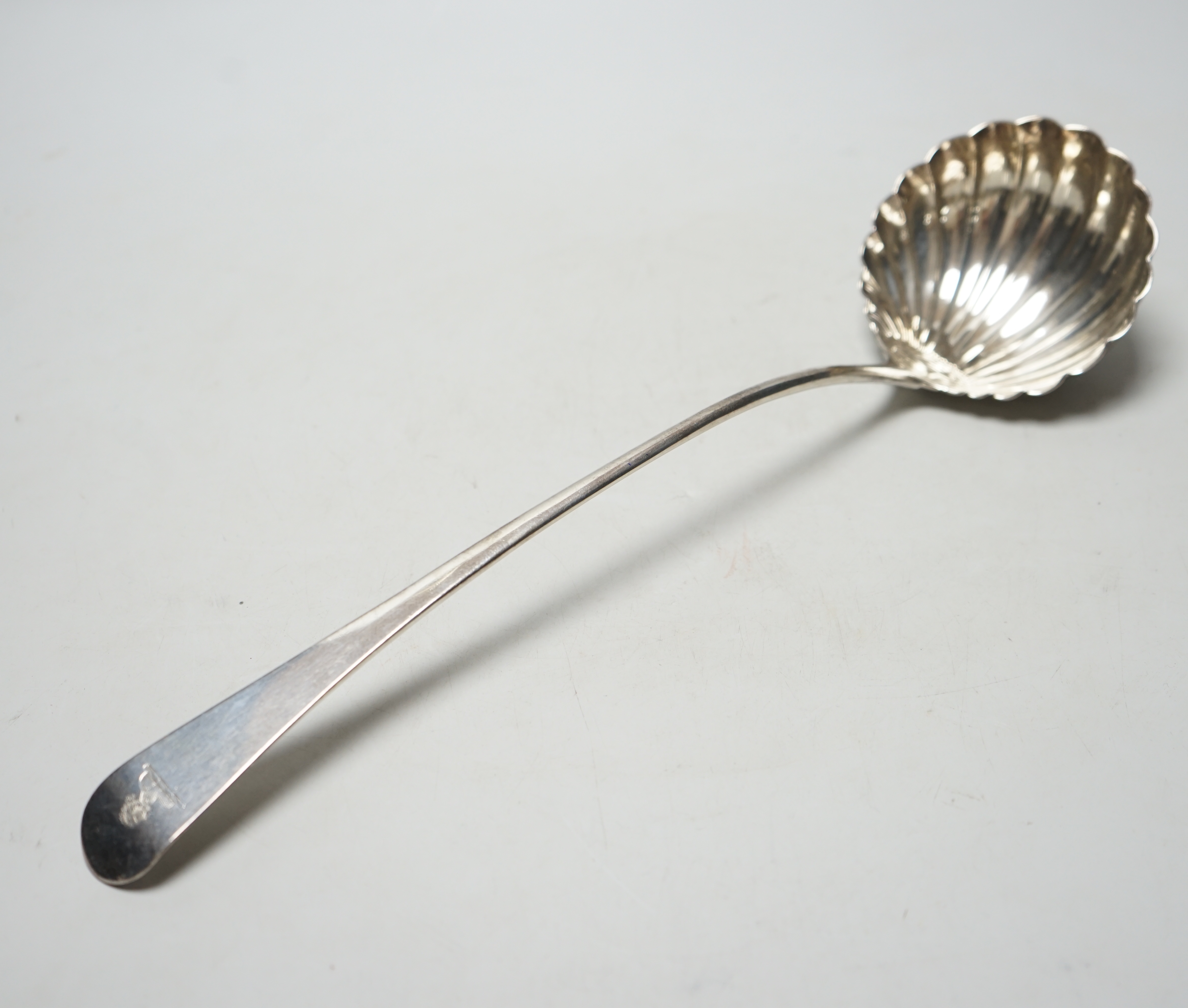 A George III silver Old English pattern soup ladle, with fluted bowl, Smith & Fearn, London, 1789, 34cm, 5.5oz.                                                                                                             