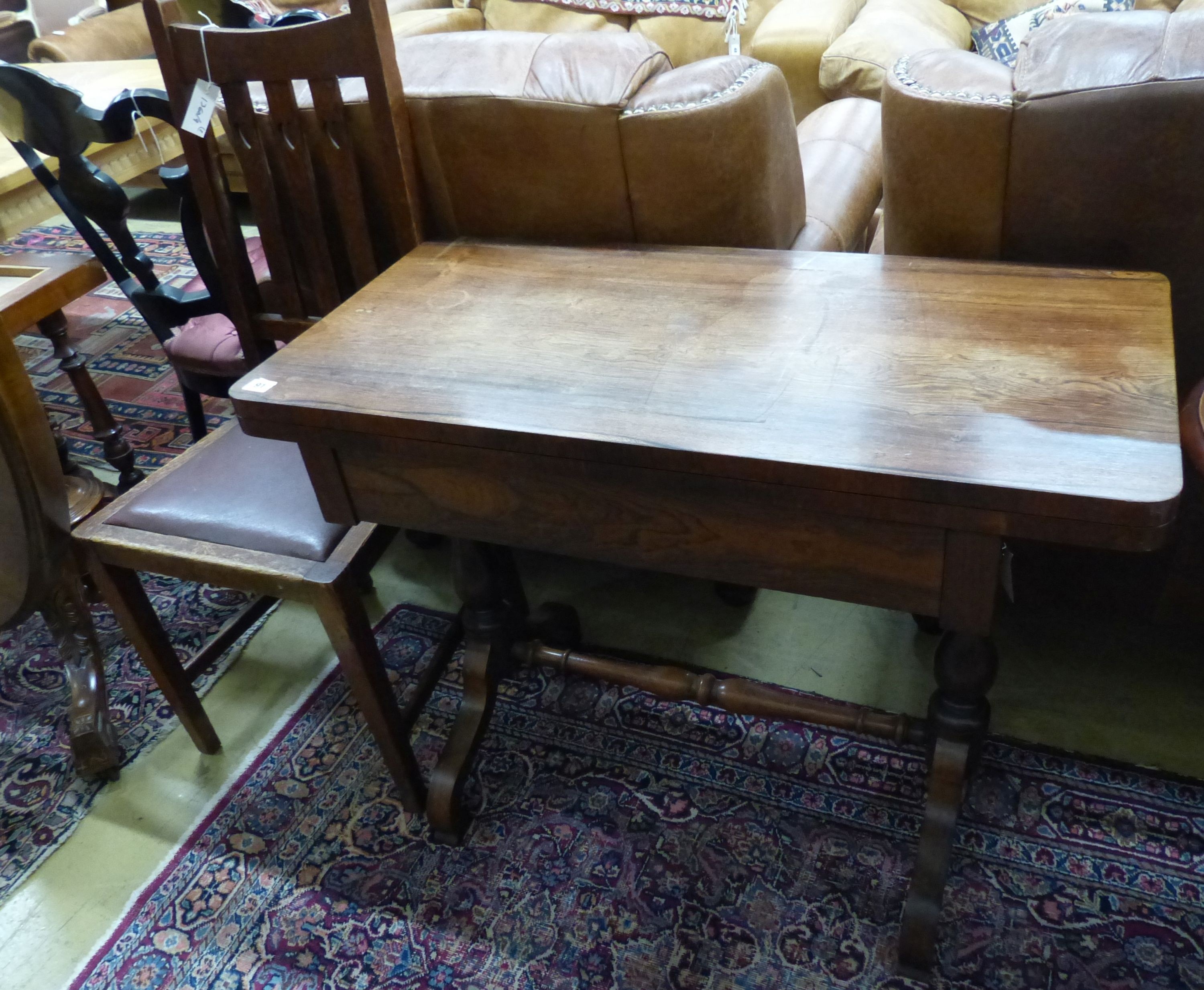 A Victorian rosewood rectangular folding card table, W.91cm D.45cm H.73cm, and an Arts and Crafts oak dining chair                                                                                                          