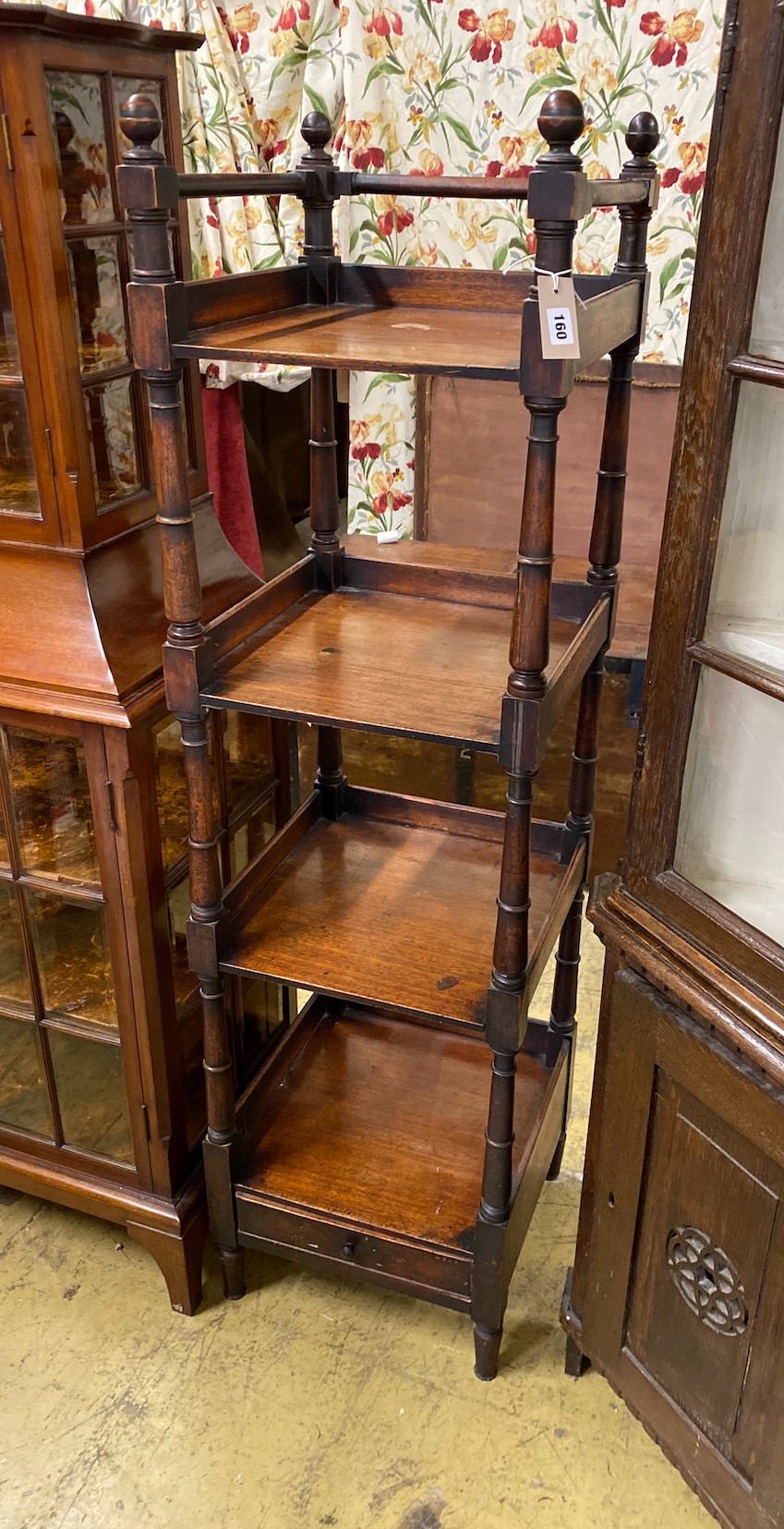 An early Victorian provincial mahogany four tier whatnot, width 44cm, depth 44cm, height 161cm                                                                                                                              