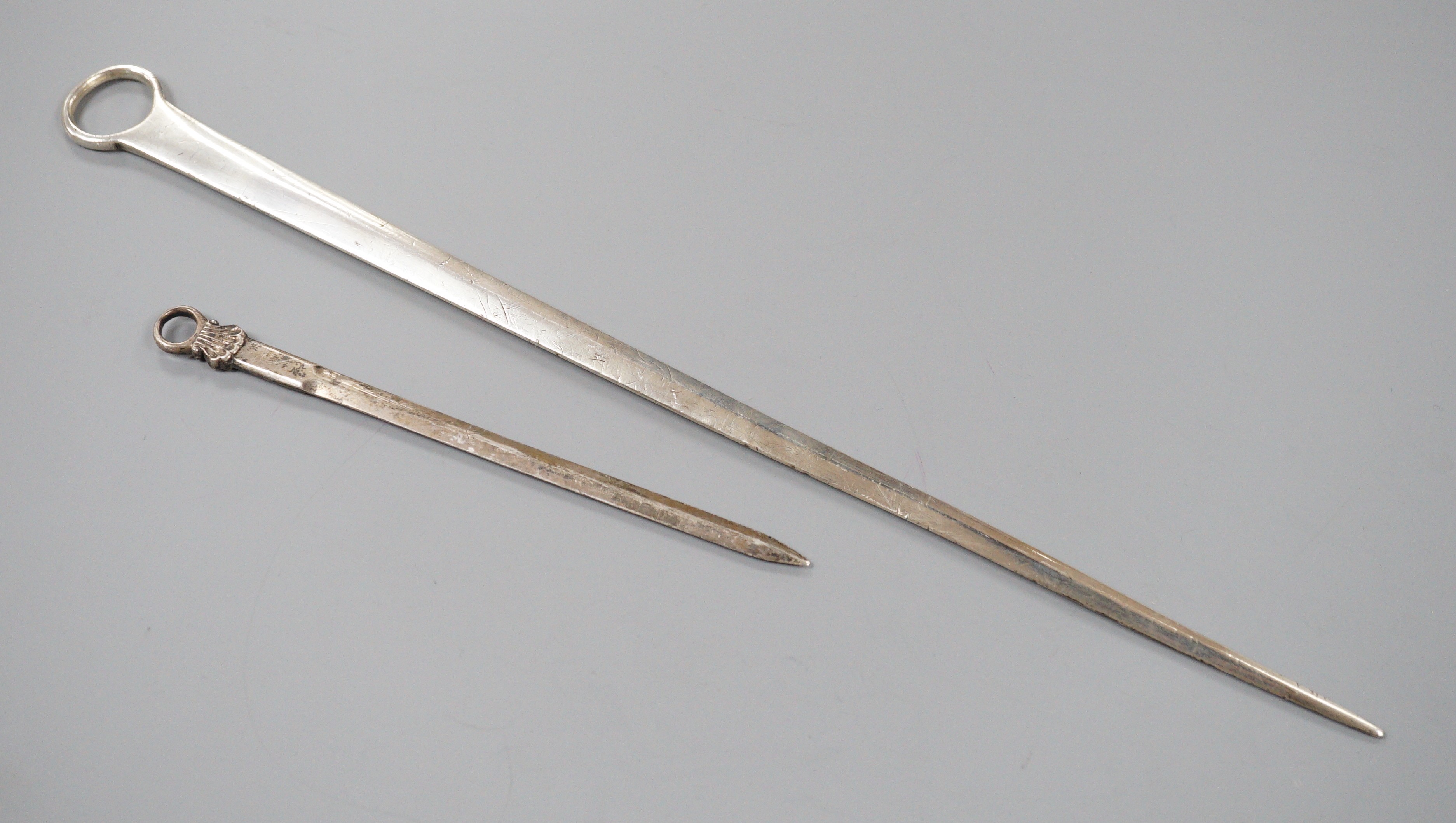 A George III silver meat skewer, Smith & Fearn, London, 1787, 32.7cm, together with a later game skewer, Eley, Fearn & Chawner, London, 1808.                                                                               