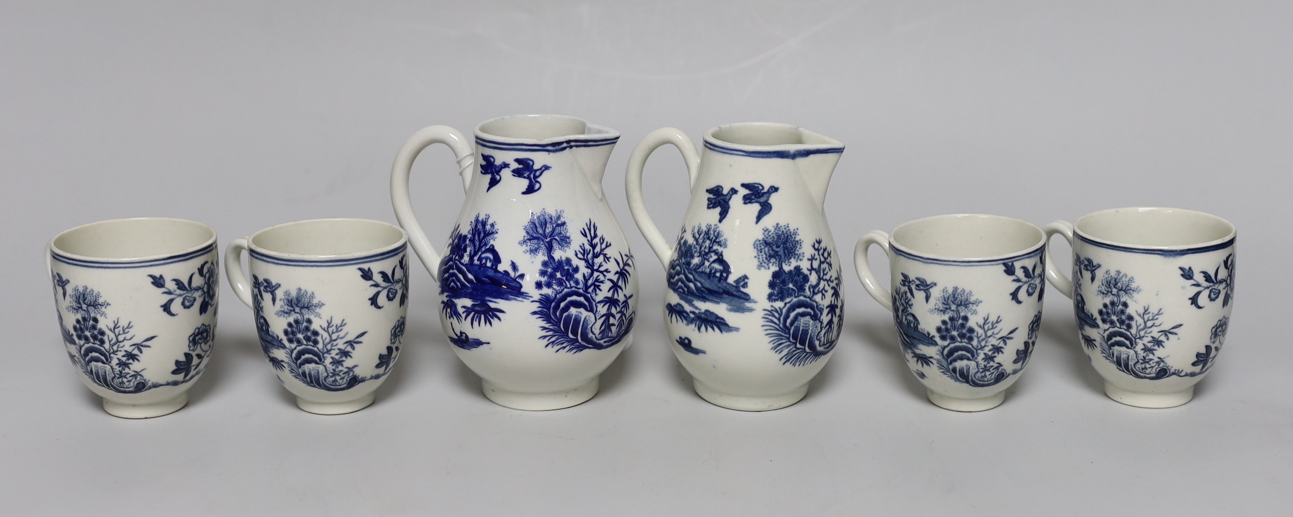 A Worcester sparrowbeak jug printed with the Fence pattern, another sparrowbeak similar and four Worcester coffee cups all printed with the Fence pattern                                                                   