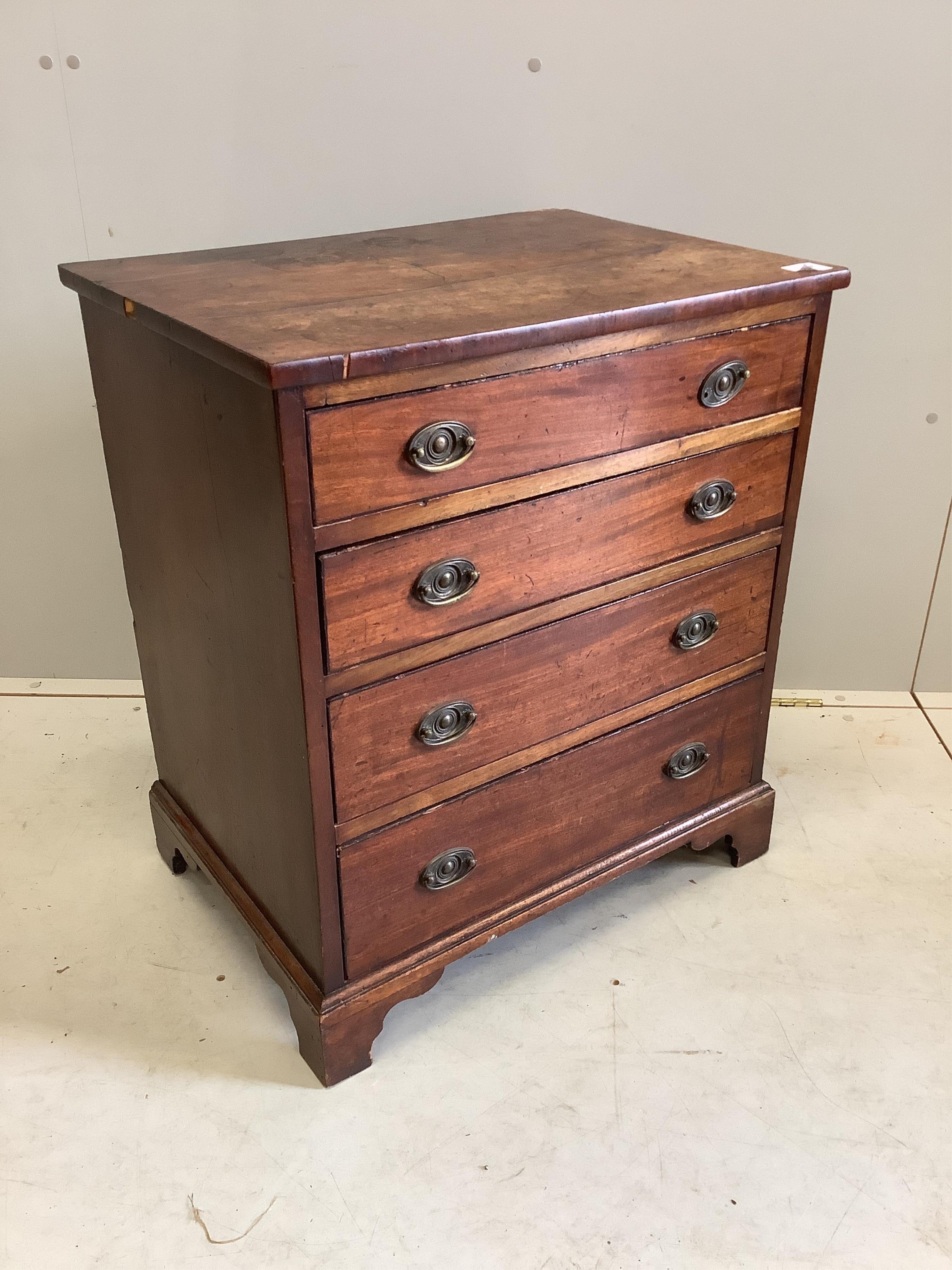 A small 19th century mahogany chest of four graduating drawers raised on bracket supports with brass loop handles, width 53cm, depth 46cm, height 73cm                                                                      