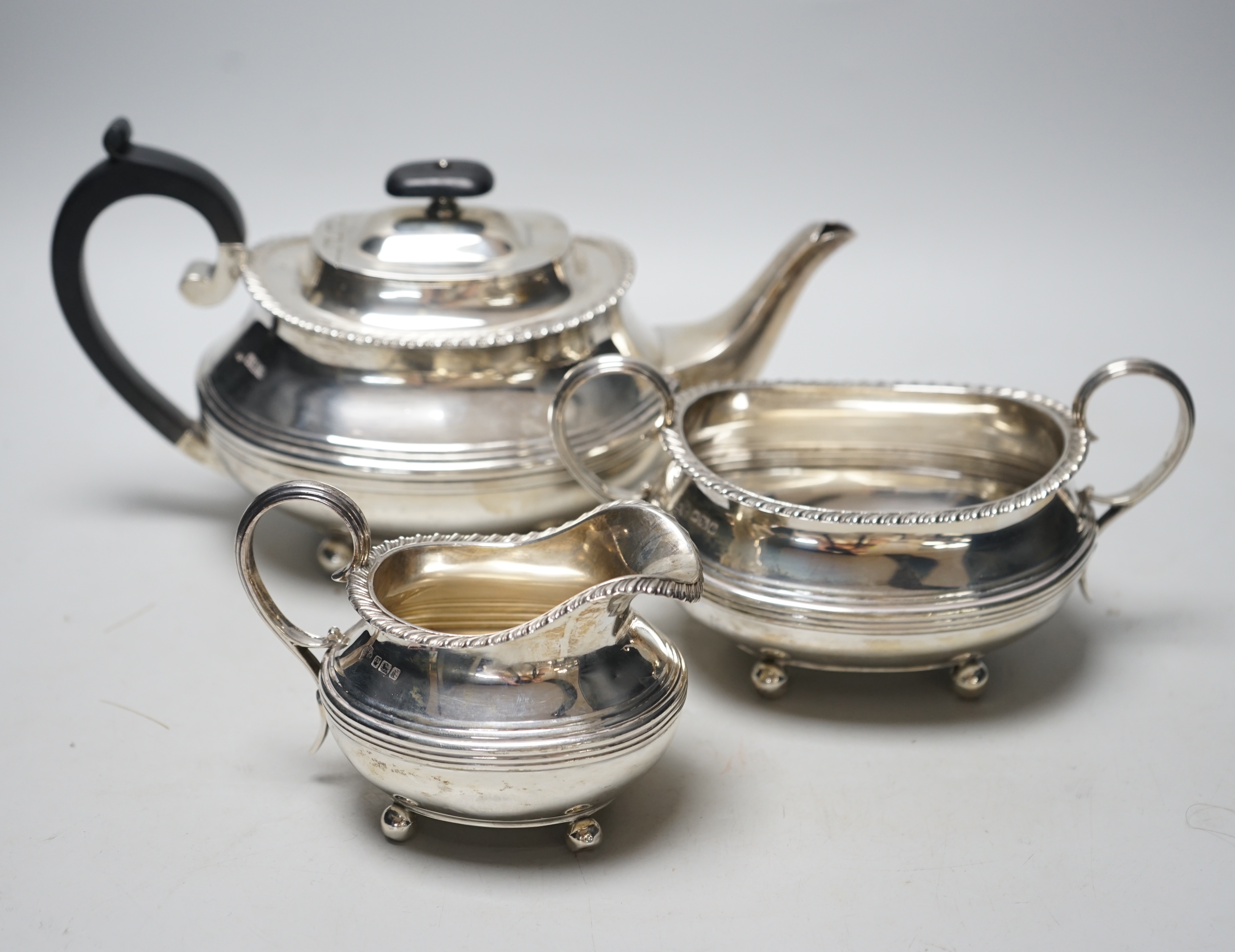 A George V three piece silver tea set, William Hutton & Sons, Sheffield, 1913/15, gross weight 37.9oz.                                                                                                                      