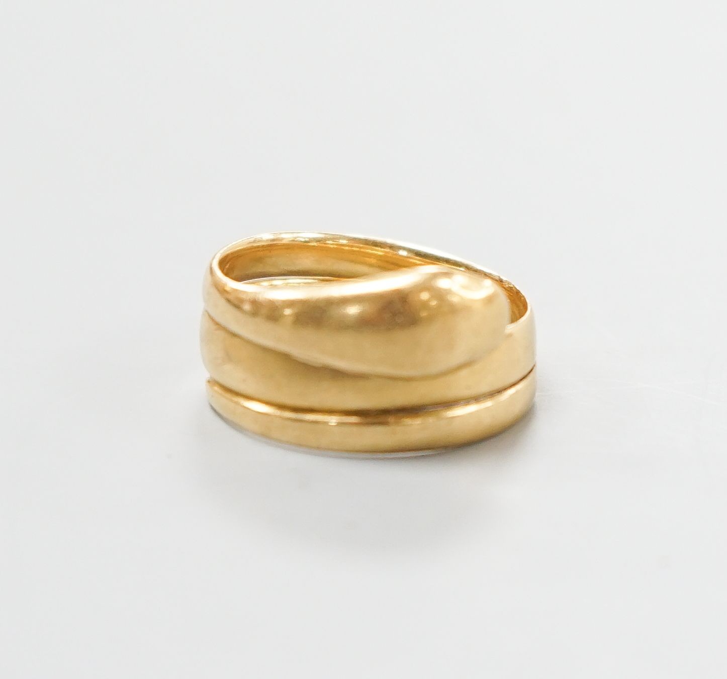 A late Victorian 18ct gold 'serpent' ring, hallmarked for Birmingham, 1876, size R/S, 8.5 grams.                                                                                                                            