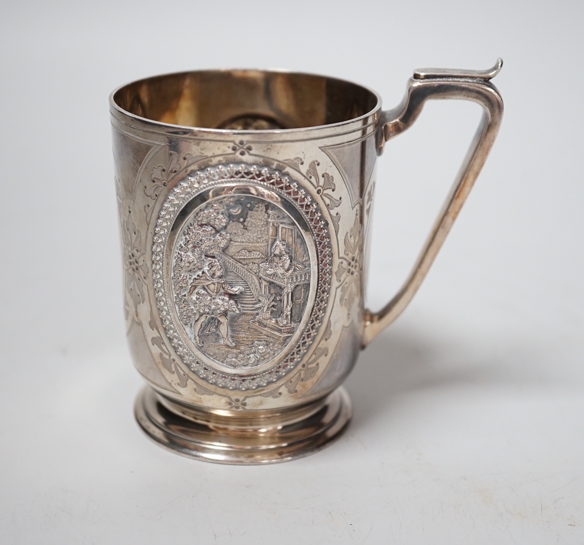 A Victorian silver christening can, with embossed panels, William & John Barnard, London, 1878, 92mm, 5.4oz.                                                                                                                
