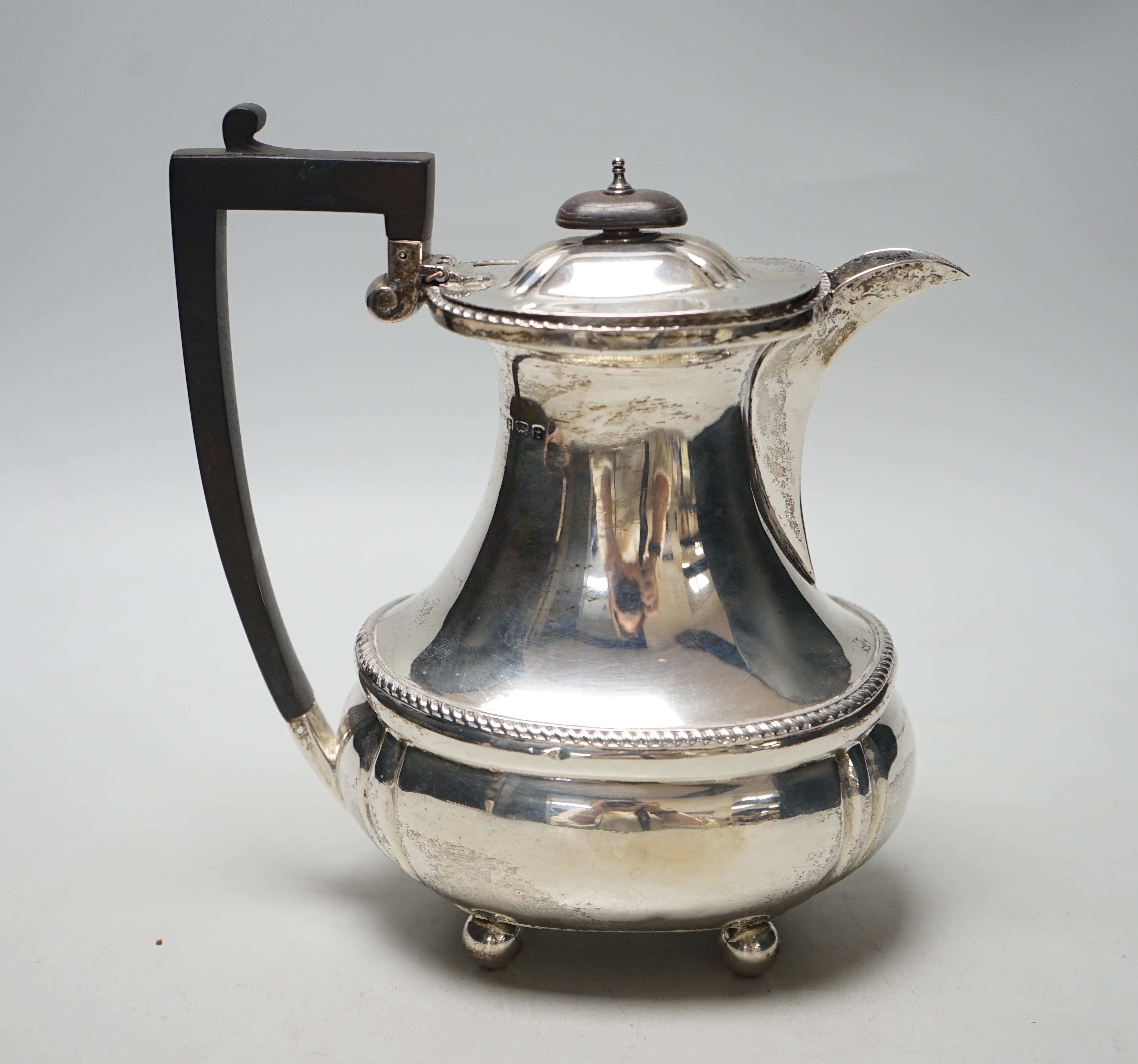 A George V silver hot water pot, Mappin & Webb, Birmingham, 1918, gross weight 15oz.                                                                                                                                        