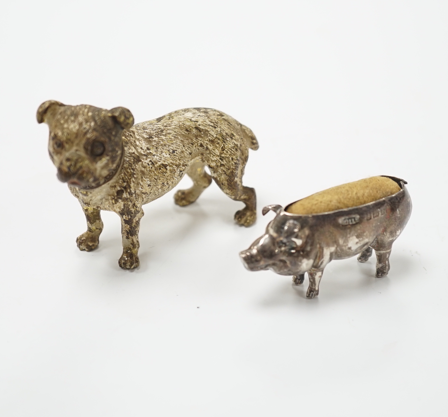 An Austrian cold painted dog, silver pig pin cushion, Adie & Lovekin, largest 6.5cm wide                                                                                                                                    