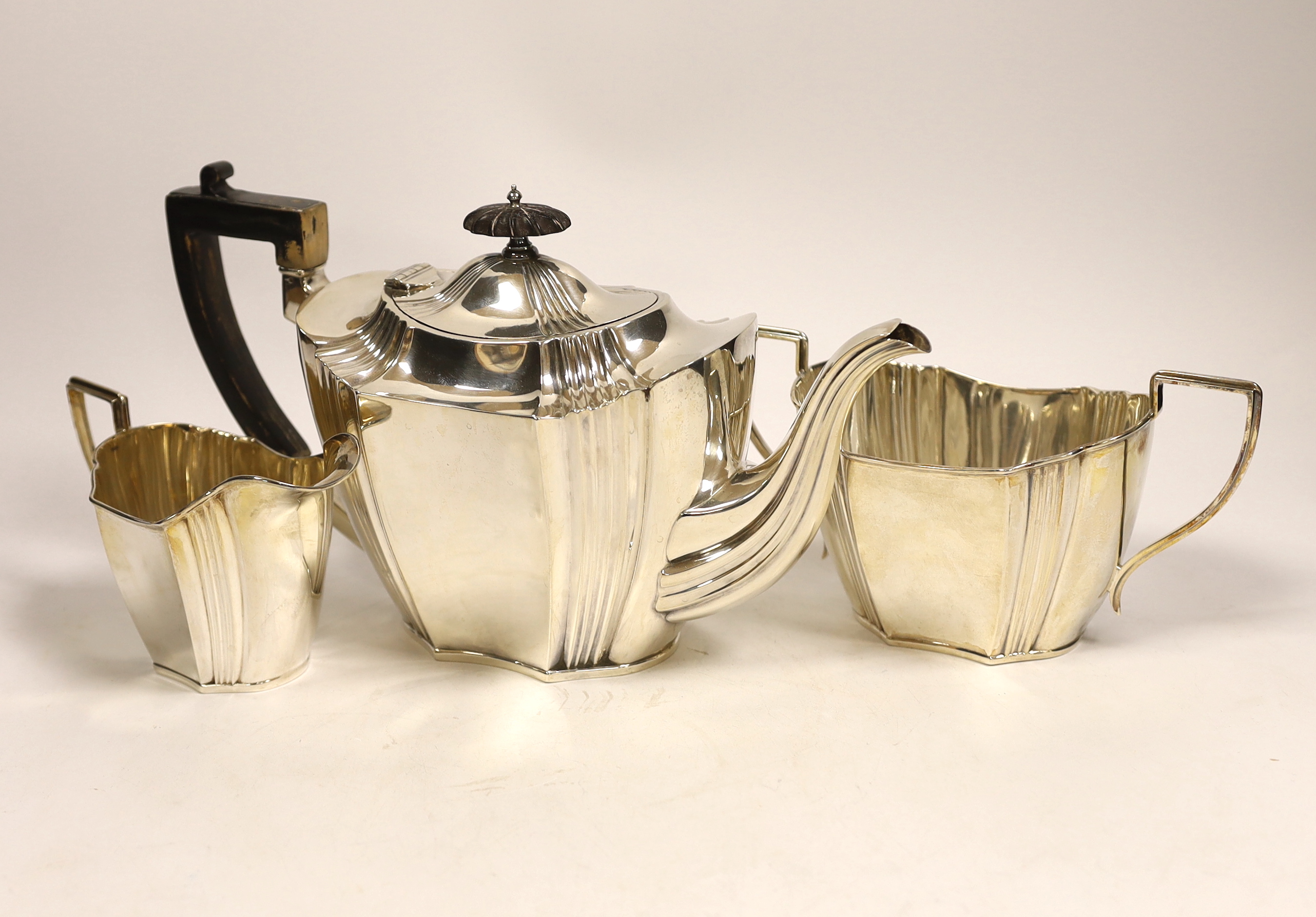 A Victorian/George V three piece silver tea set, Henry Wigful, Sheffield, 1898 & 1911, gross weight 25.9oz.                                                                                                                 