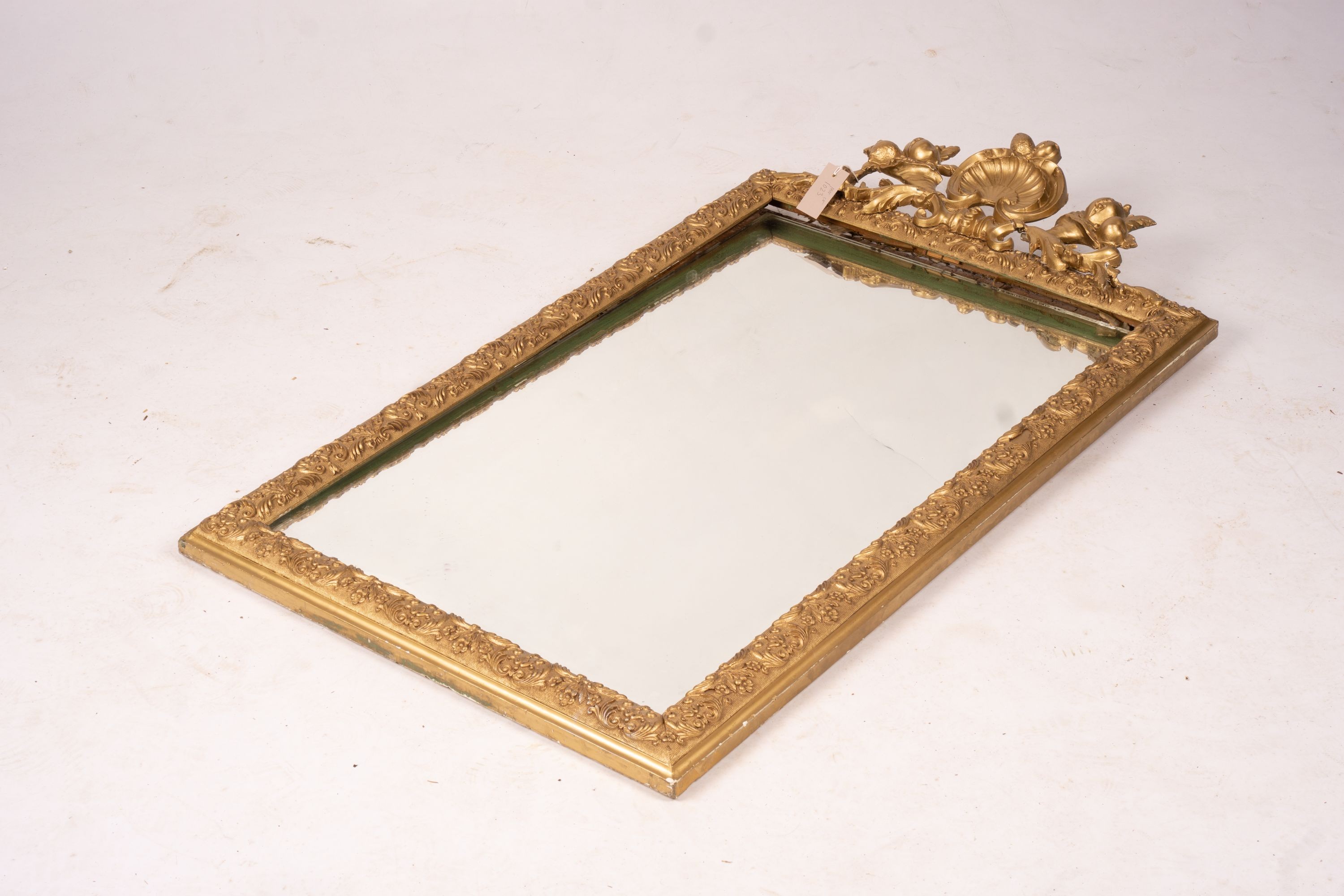 A 19th century French gilt gesso wall mirror, width 64cm, height 116cm together with a modern larger rectangular wall mirror                                                                                                