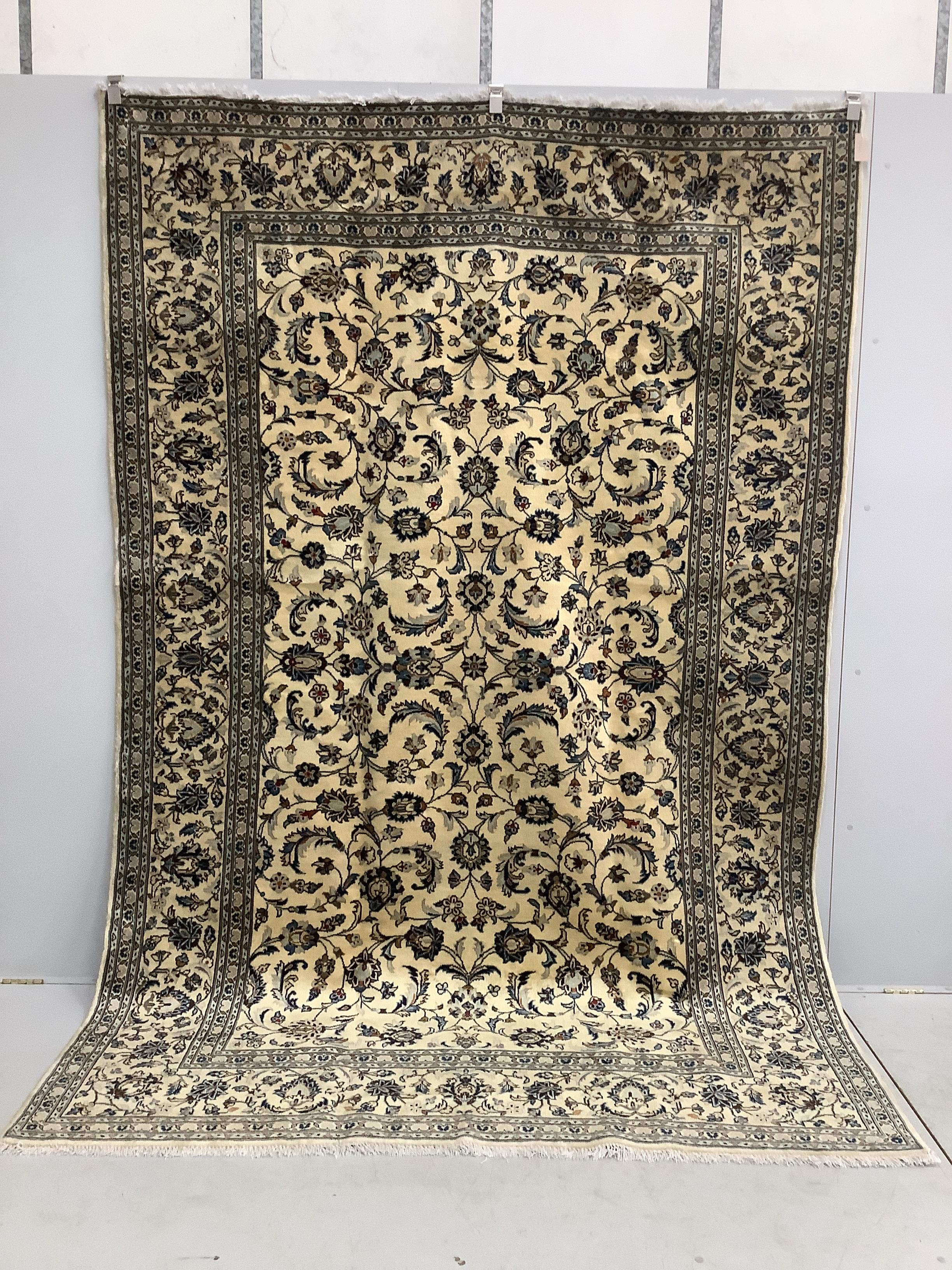 A Kashan ivory ground carpet, 302 x 196cm                                                                                                                                                                                   