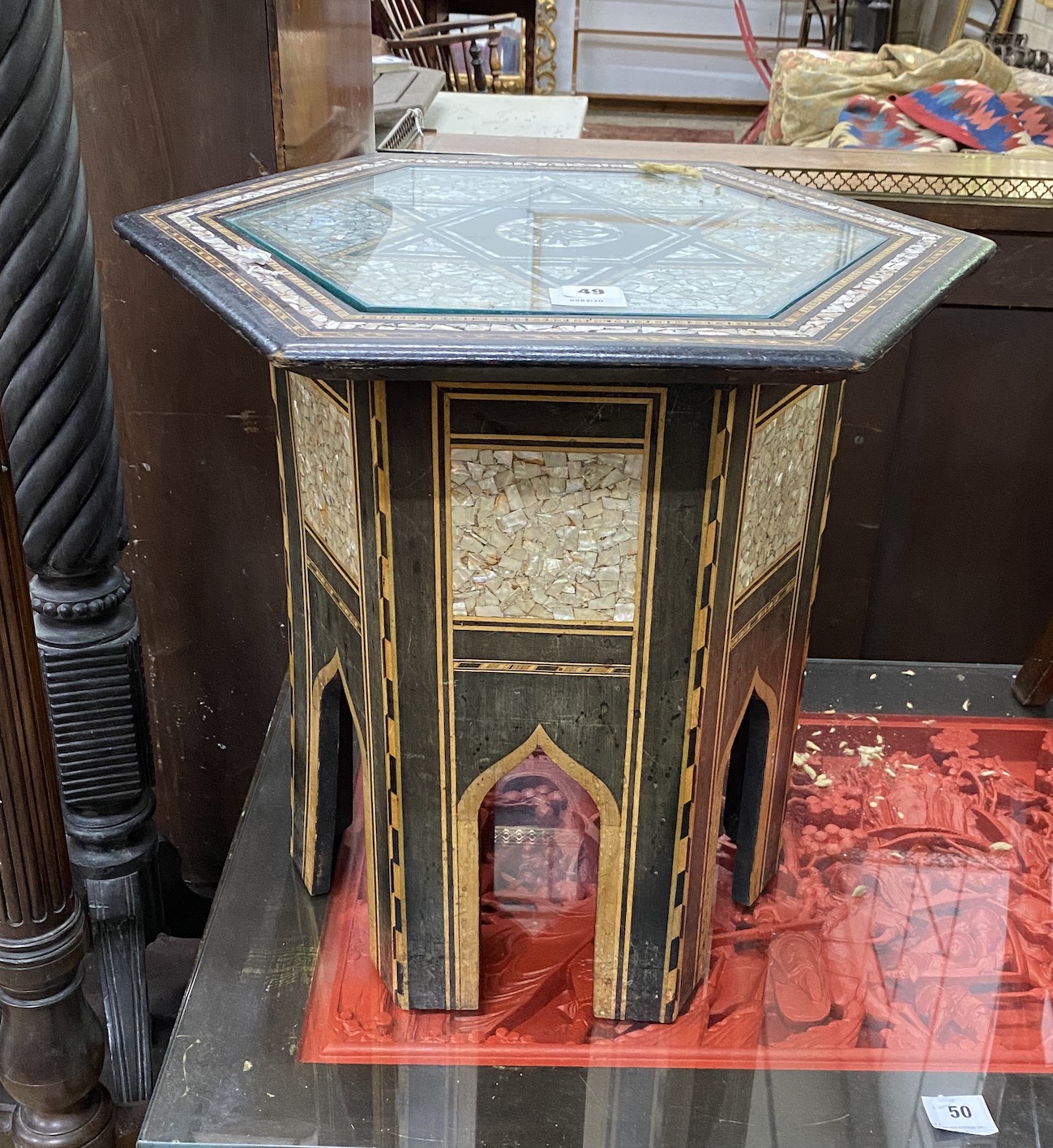 An early 20th century Moorish mother of pearl inlaid hexagonal occasional table, width 49cm, height 50cm                                                                                                                    