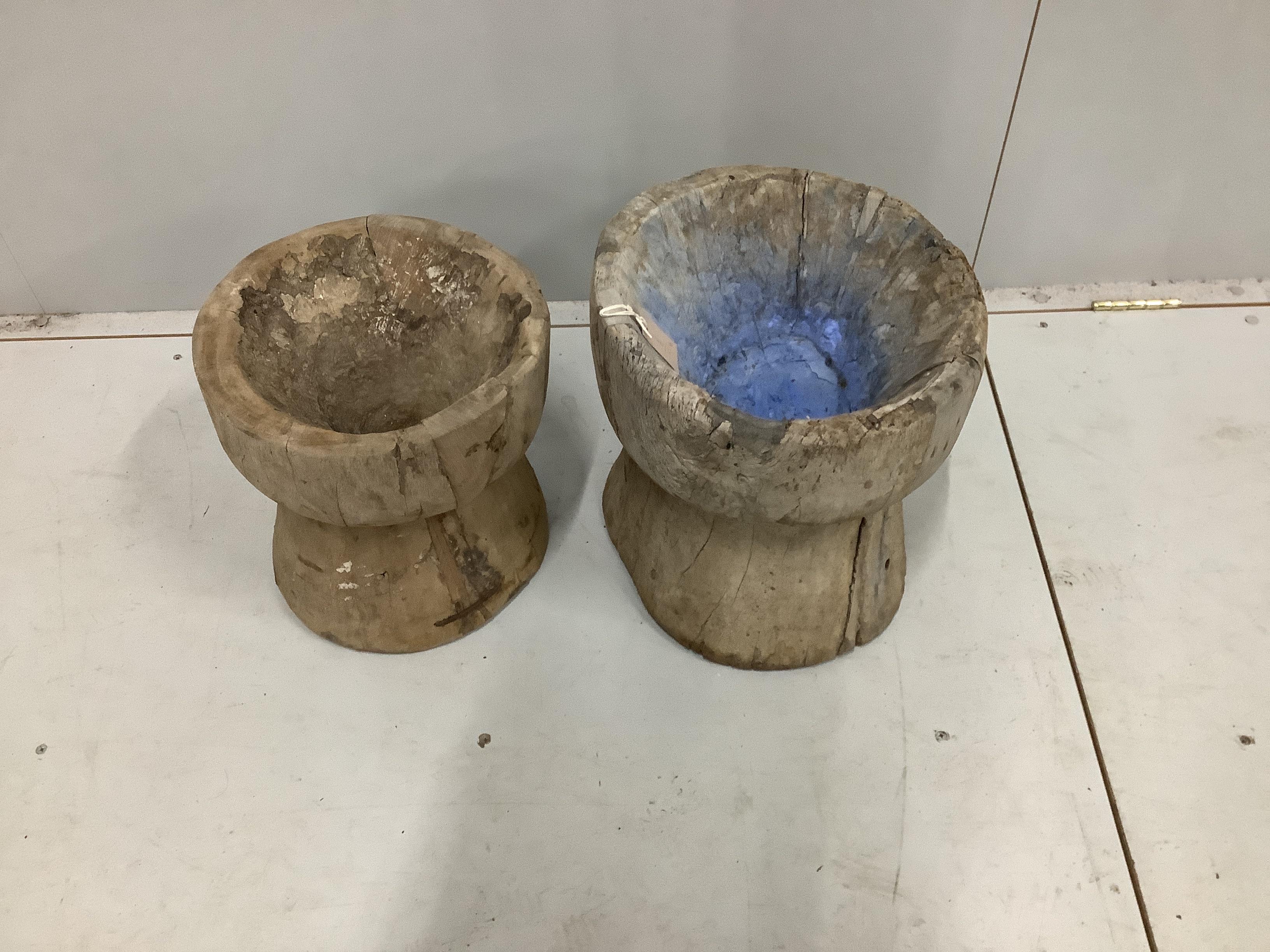 Two African carved hardwood mortars, larger width 35cm, height 33cm                                                                                                                                                         