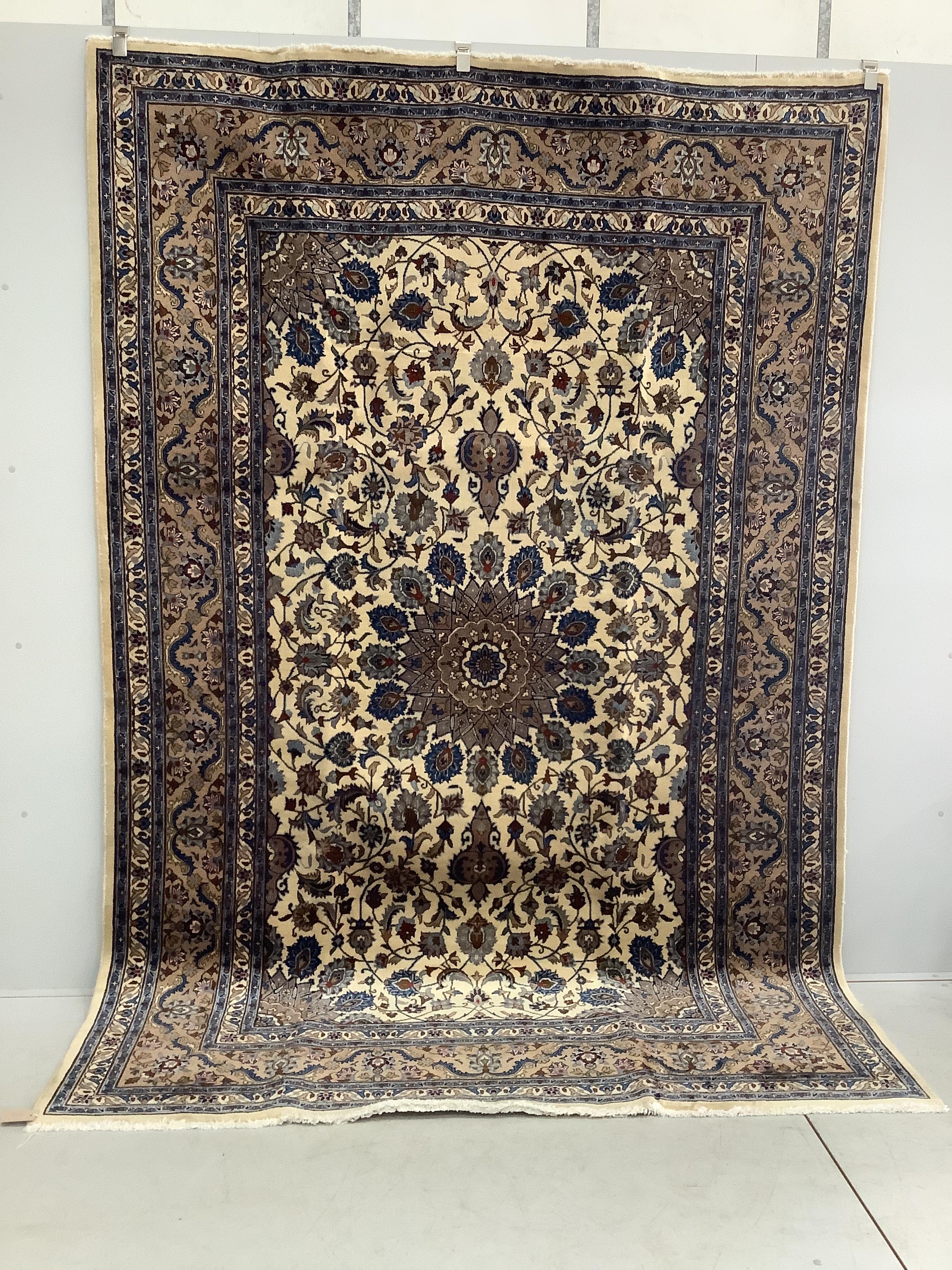 A Meshed ivory ground carpet, 294 x 196cm                                                                                                                                                                                   