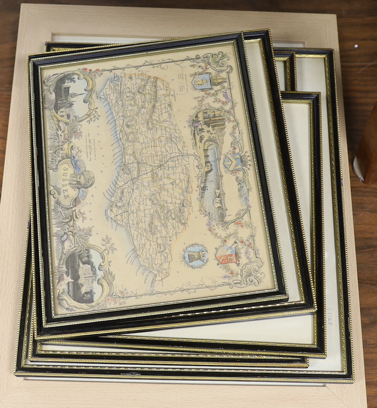 Seven framed Sussex related 18th and 19th century maps, including examples by T. Moule, T. Kitchin, J. Ellis, etc. largest 32 x 22cm                                                                                        