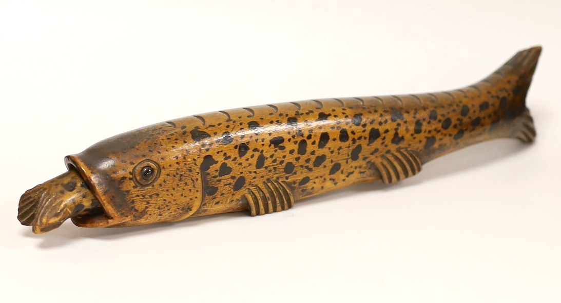 A 19th century treen flask with stopper, modelled as a rainbow trout, 26.5cm.                                                                                                                                               