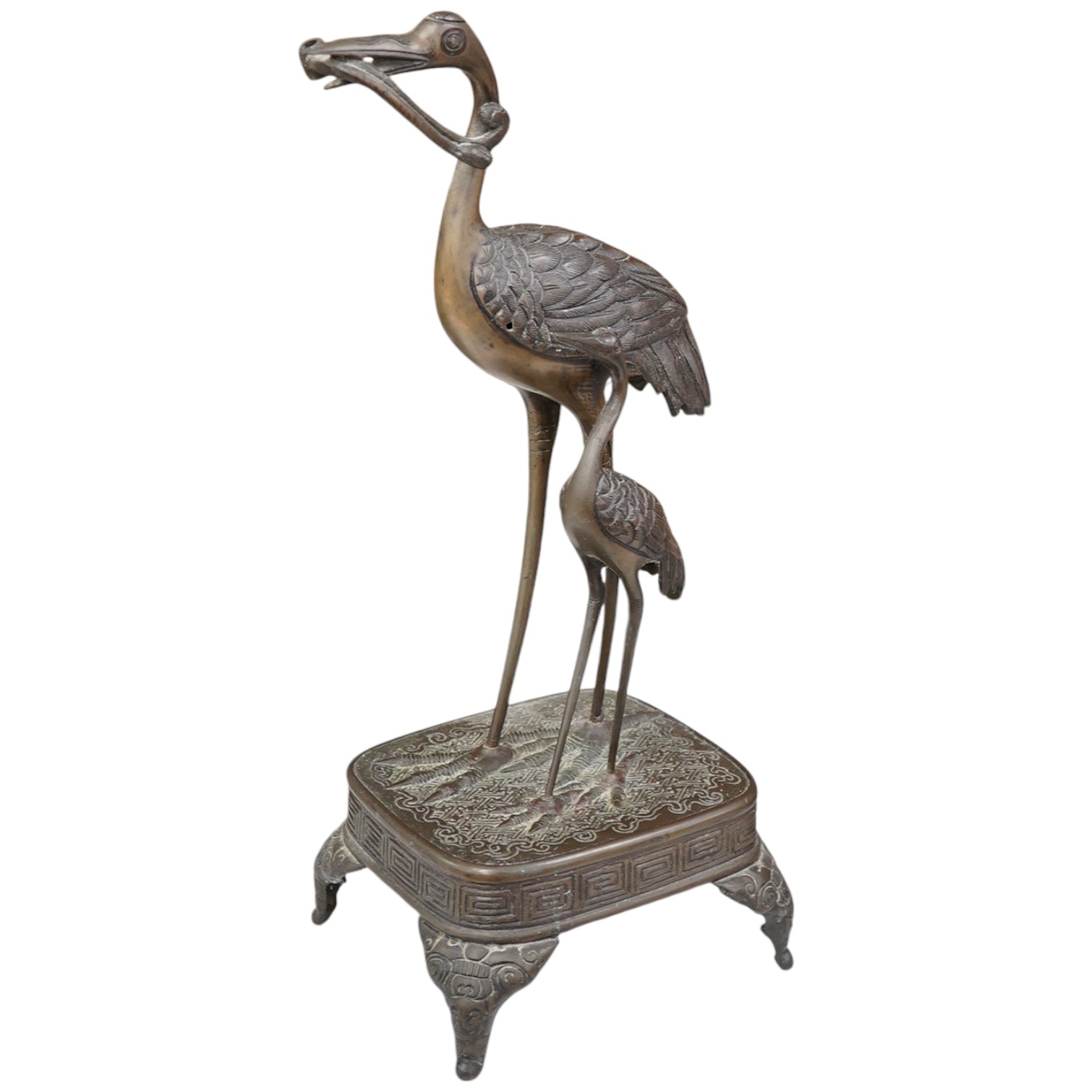 A Japanese bronze group of cranes, 19th century, 39cm high. Condition - section missing from prey in mouth                                                                                                                  