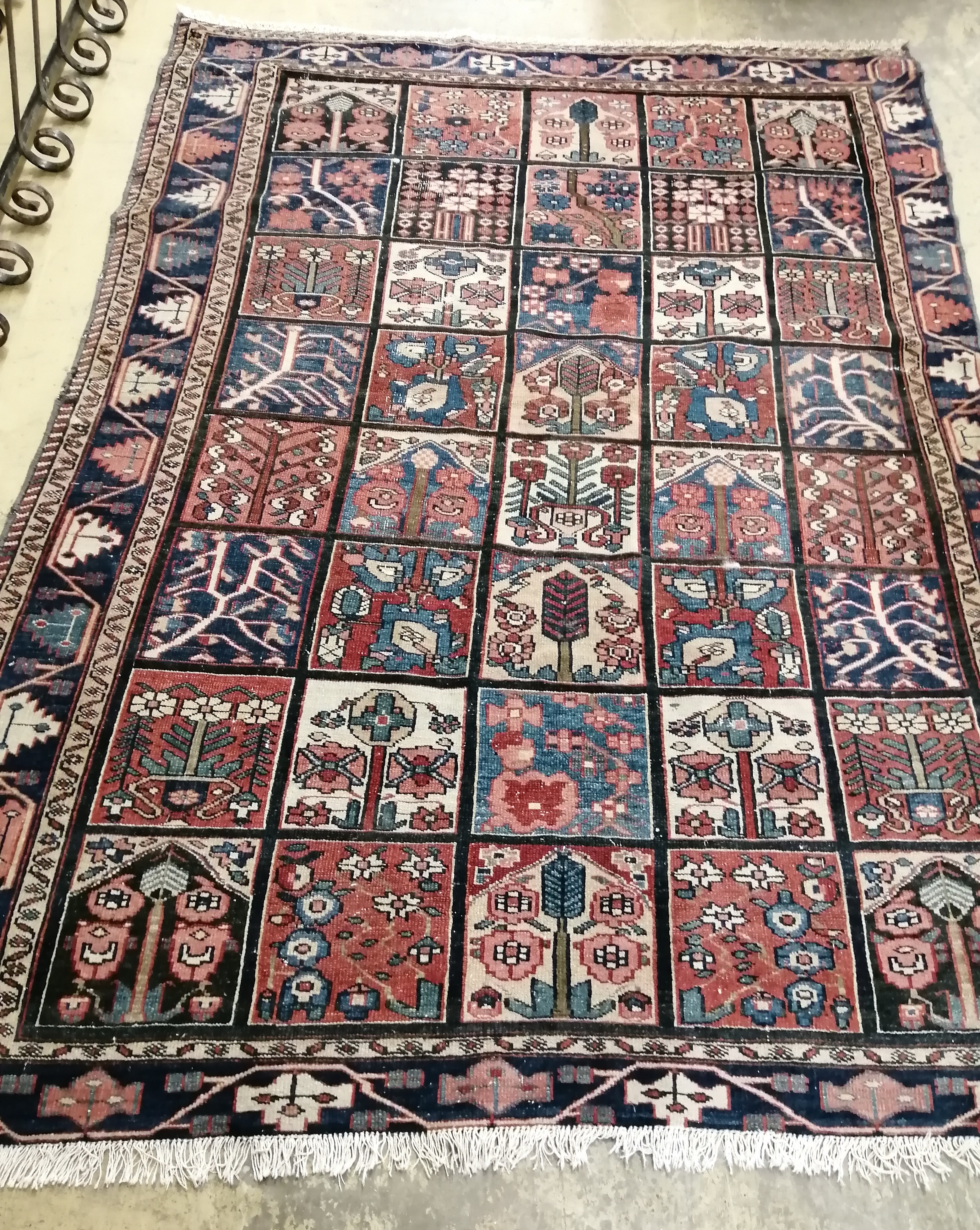 A Baktiari blue ground rug, 202 x 144cm                                                                                                                                                                                     