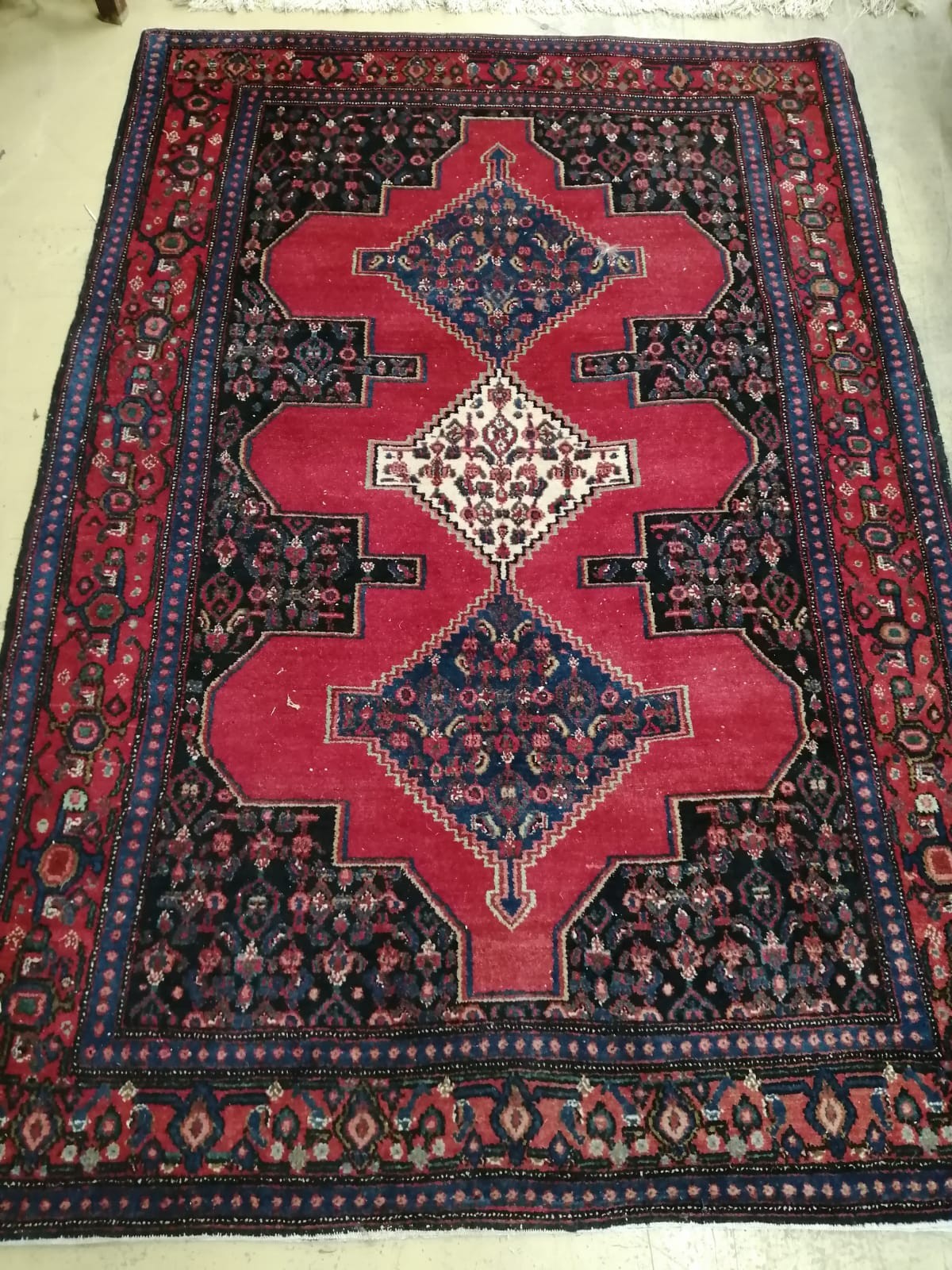 A North West Persian rug, 184 x 124cm                                                                                                                                                                                       