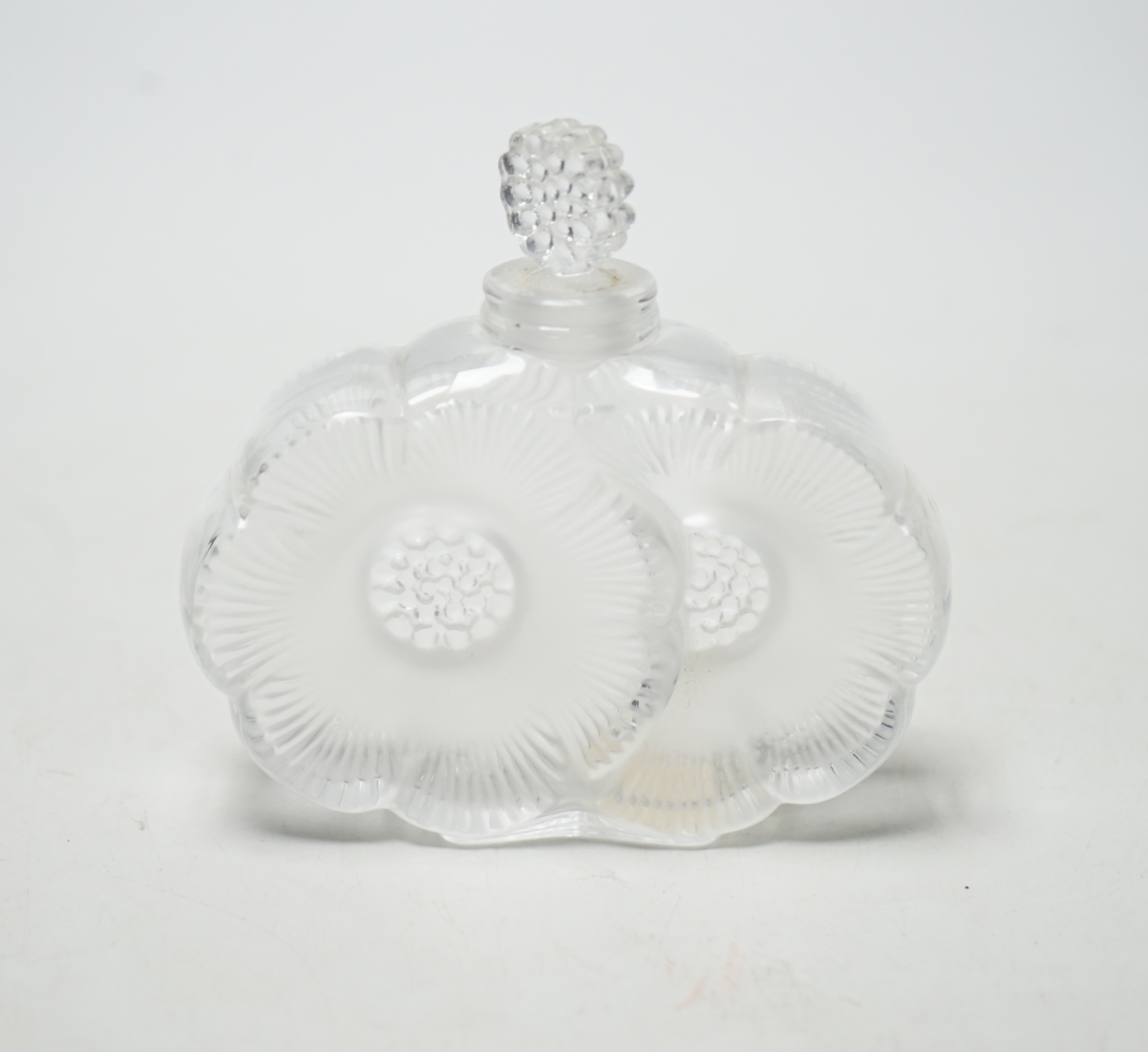 A Lalique ‘Deux Fleur’ glass scent bottle, 9.5cm wide                                                                                                                                                                       