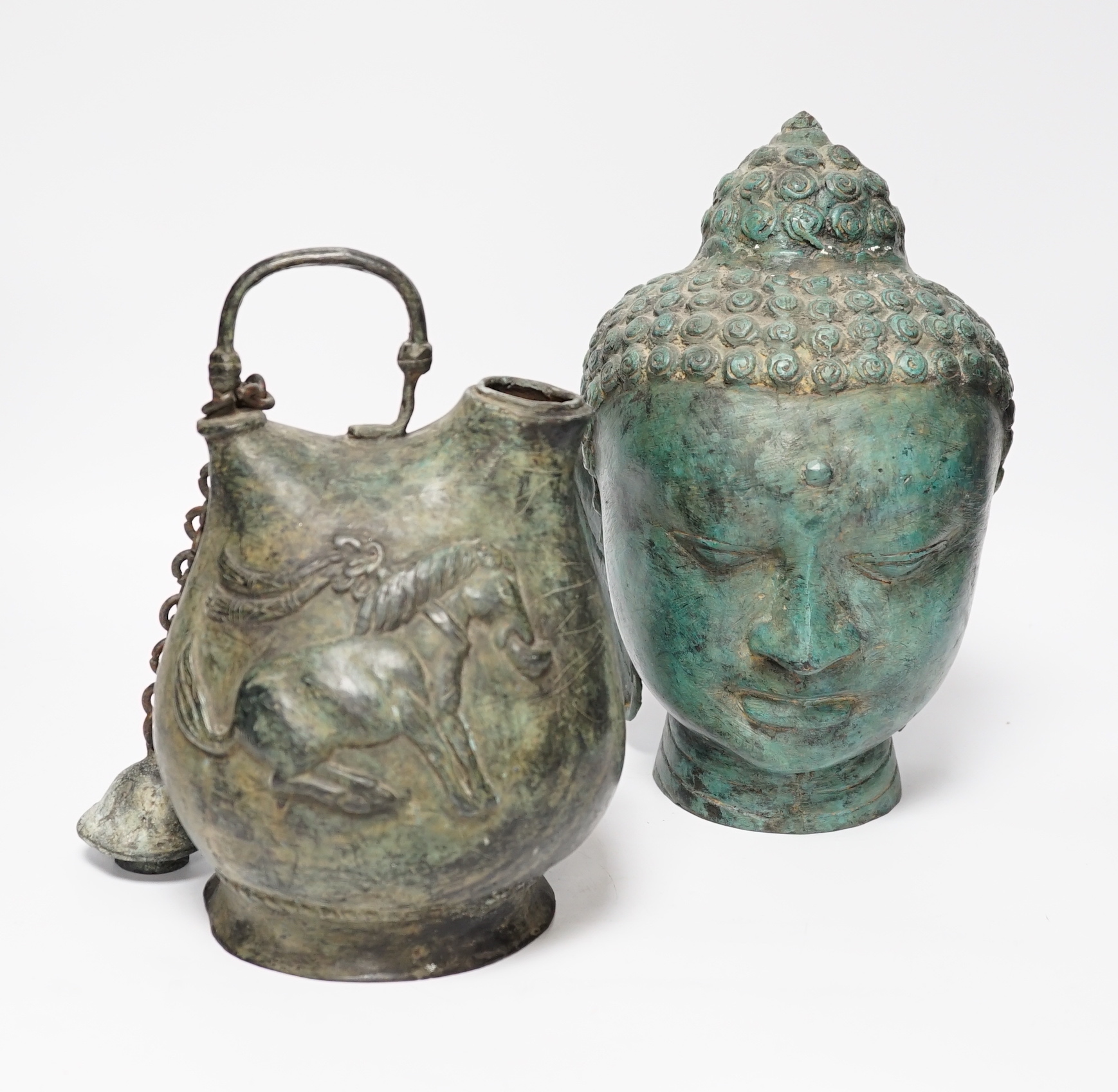 After the Antique, a Thai bronze Buddha head and a ewer, tallest 27cm                                                                                                                                                       
