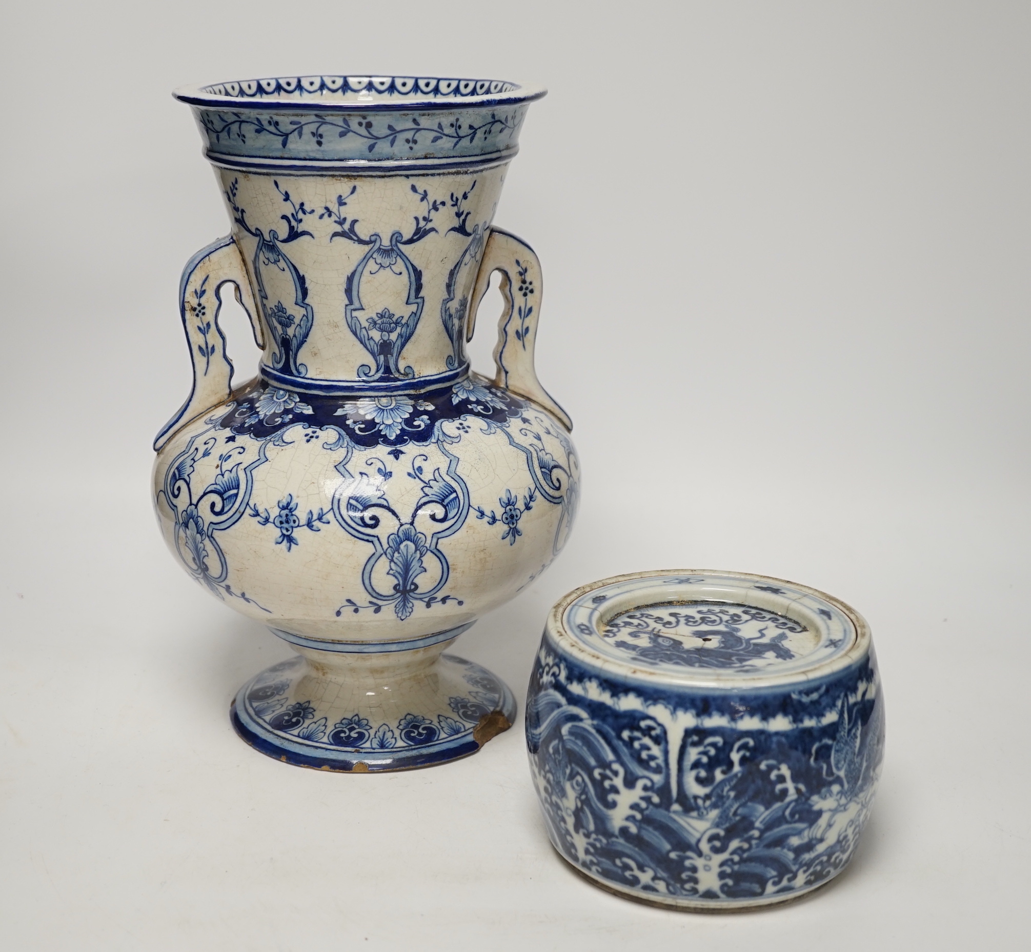 A Chinese blue and white jar and cover, Xuande mark, probably late Qing and a French faience vase (2) tallest 29.5cm                                                                                                        