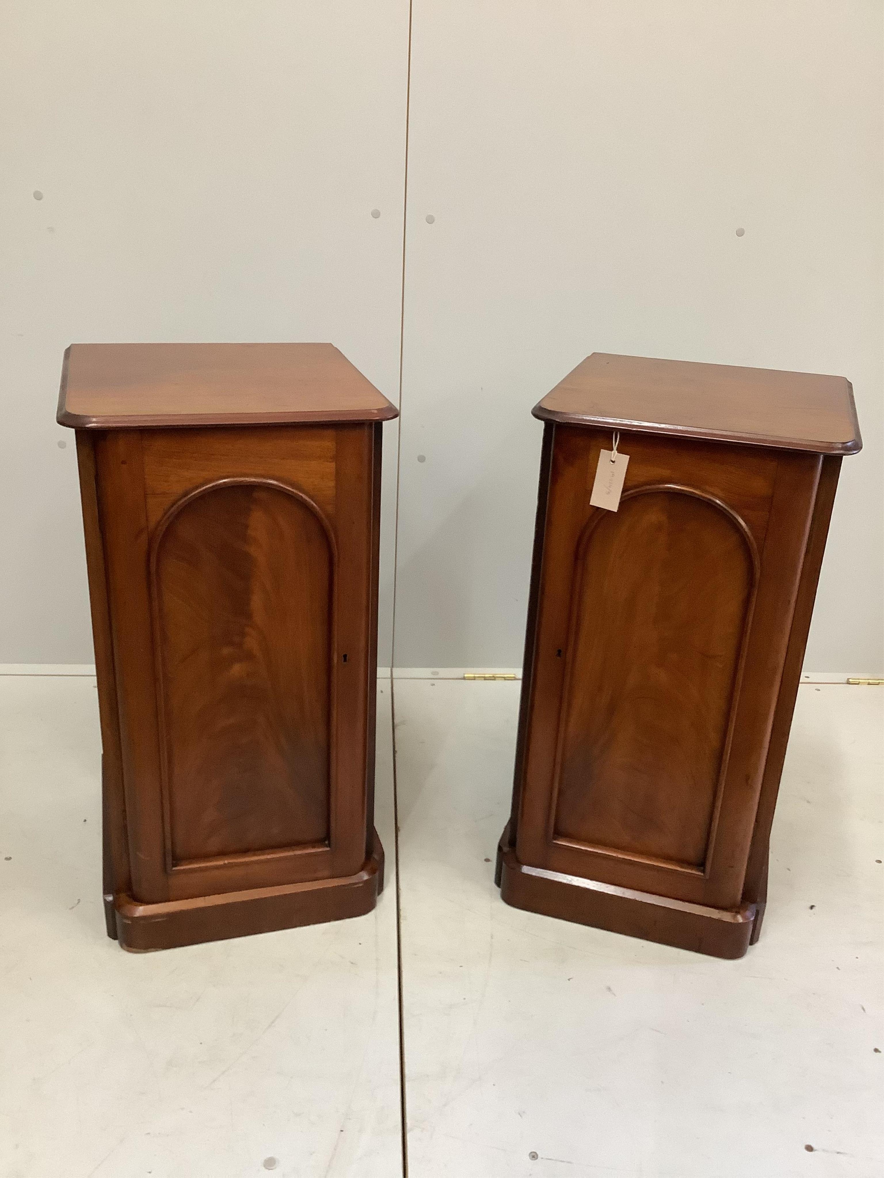 A pair of Victorian and later mahogany bedside cabinets, width 38cm, depth 41cm, height 73cm                                                                                                                                