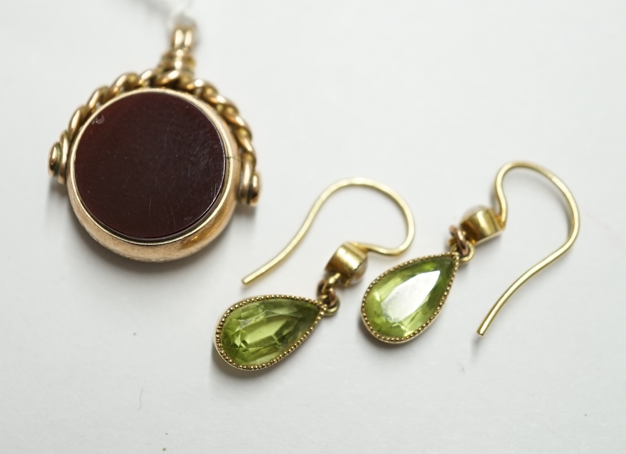 A pair of yellow metal peridot? and seed pearl set drop earrings, 11mm, together with a late Victorian 9ct gold, carnelian and bloodstone set spinning fob. Condition - fair                                                