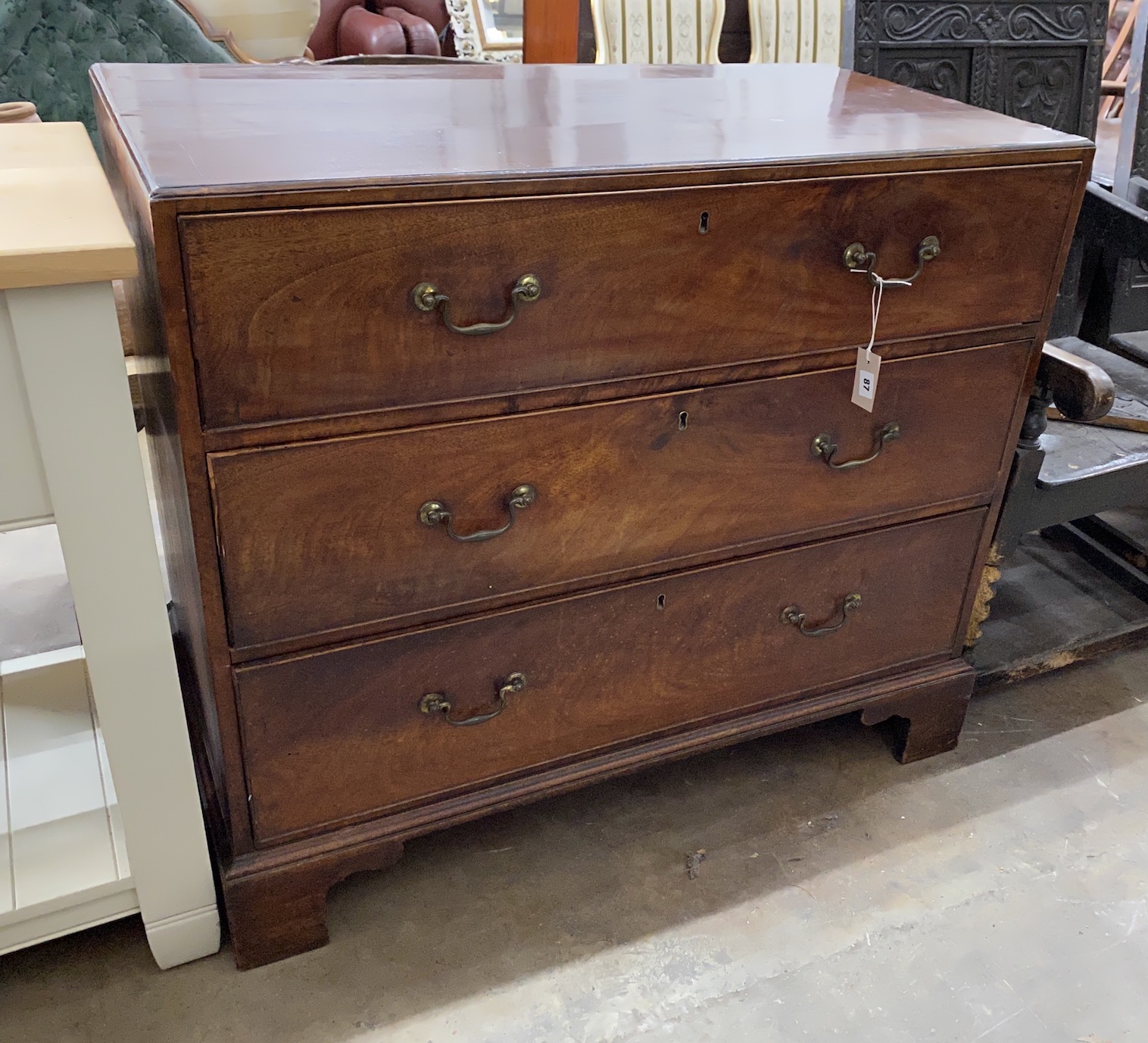 A George III mahogany three drawer chest, width 105cm, depth 55cm, height 92cm                                                                                                                                              