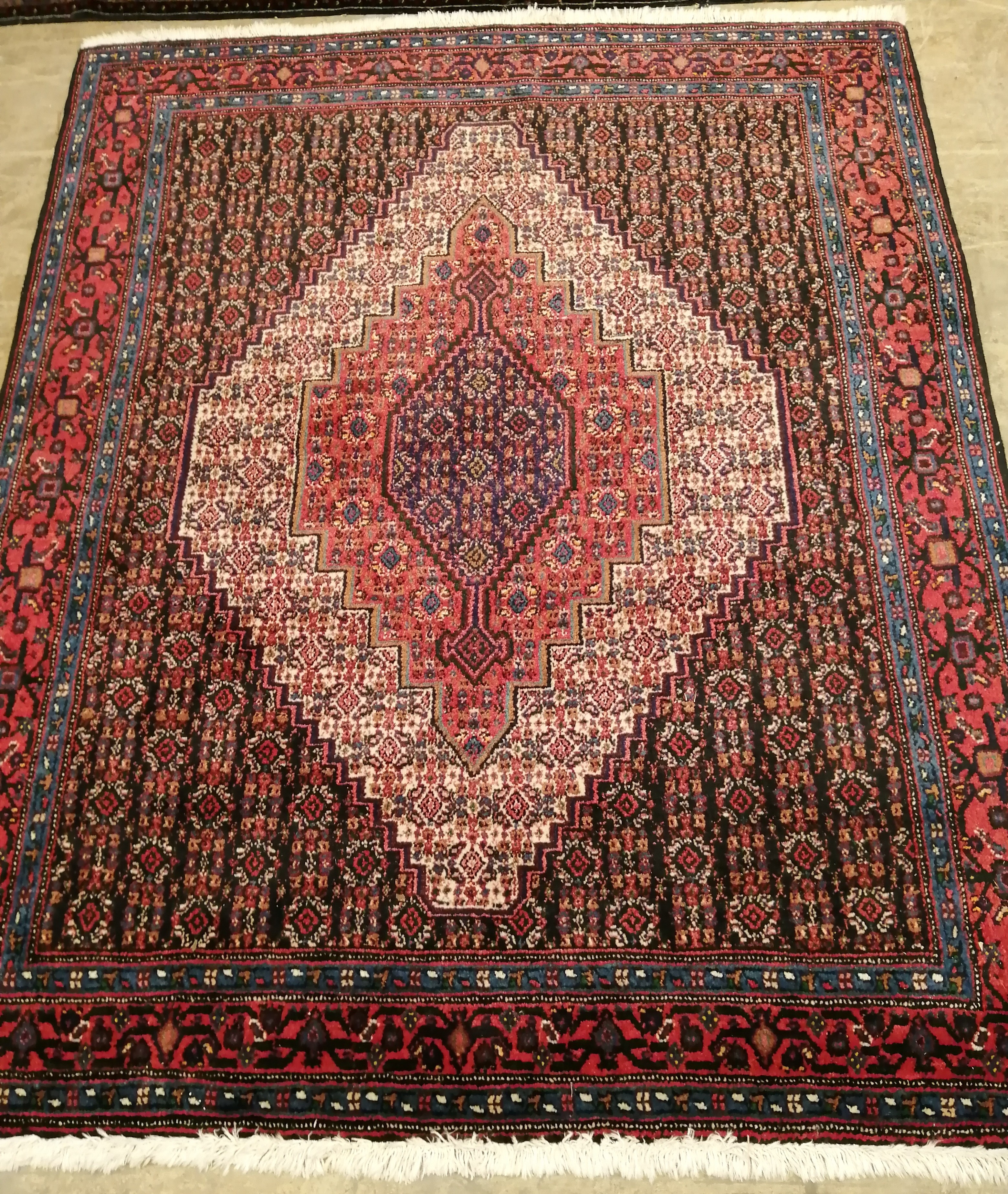 A North West Persian rug, 150 x 125cm                                                                                                                                                                                       