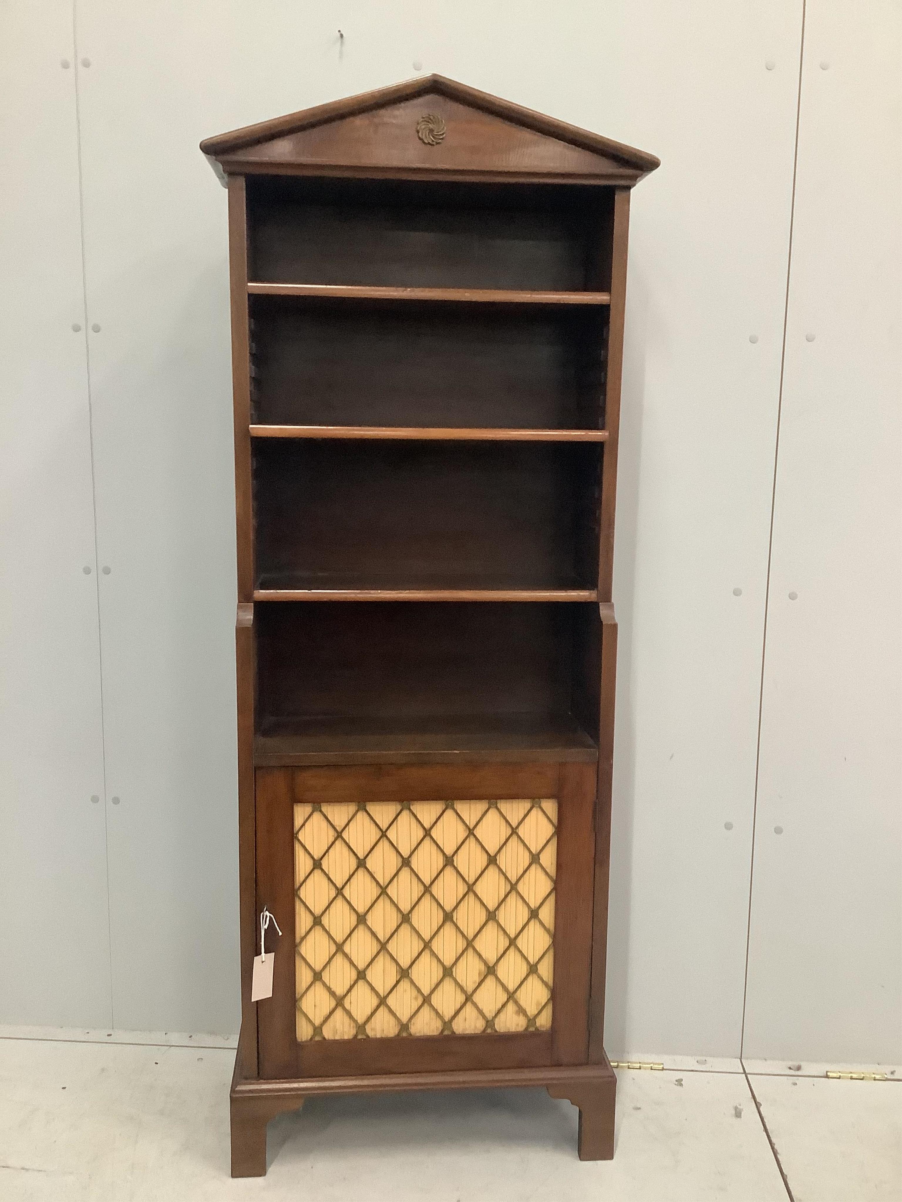 A Regency style mahogany open bookcase, width 60cm, depth 26cm, height 166cm. Condition - fair                                                                                                                              