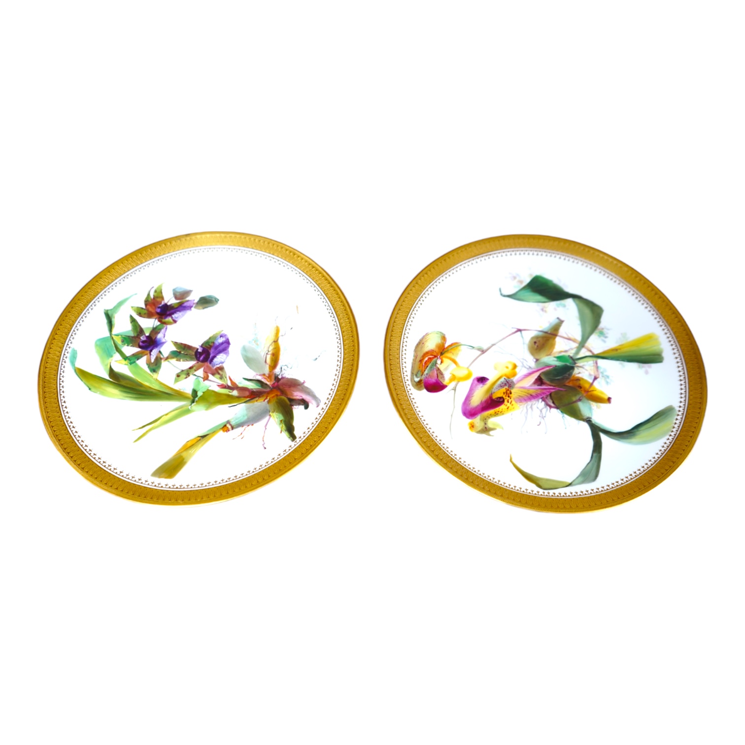 A pair of 19th century Mintons bone china plates, hand painted with flowers, 24cm in diameter. Condition - good                                                                                                             