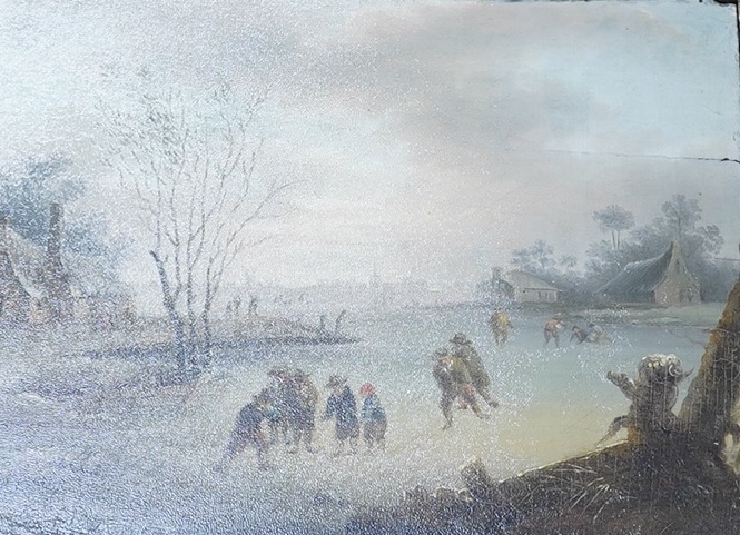 After David Teniers (1610-1690), oil on board, Dutch winter landscape with skaters on a frozen lake, applied plaque to the frame, 20 x 26cm, gilt framed. Condition - fair                                                  