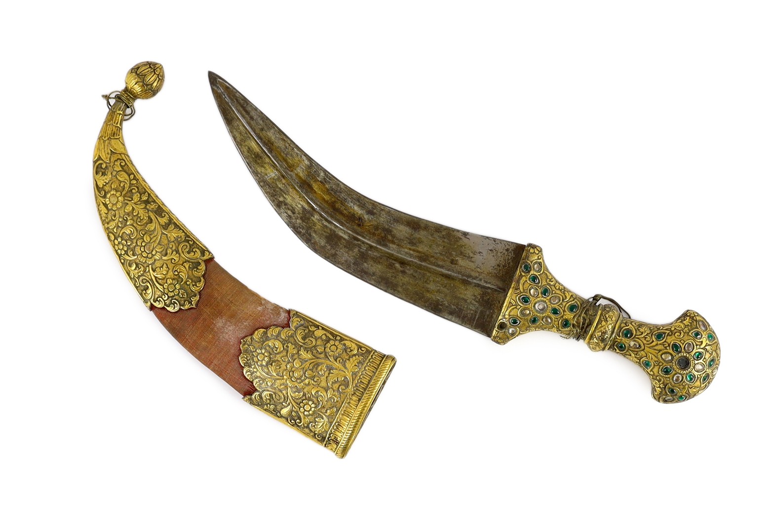 An Indian gilt copper and paste mounted dagger (jambiya), Kutch, 19th century, dagger 33cm long, scabbard 22cm long                                                                                                         