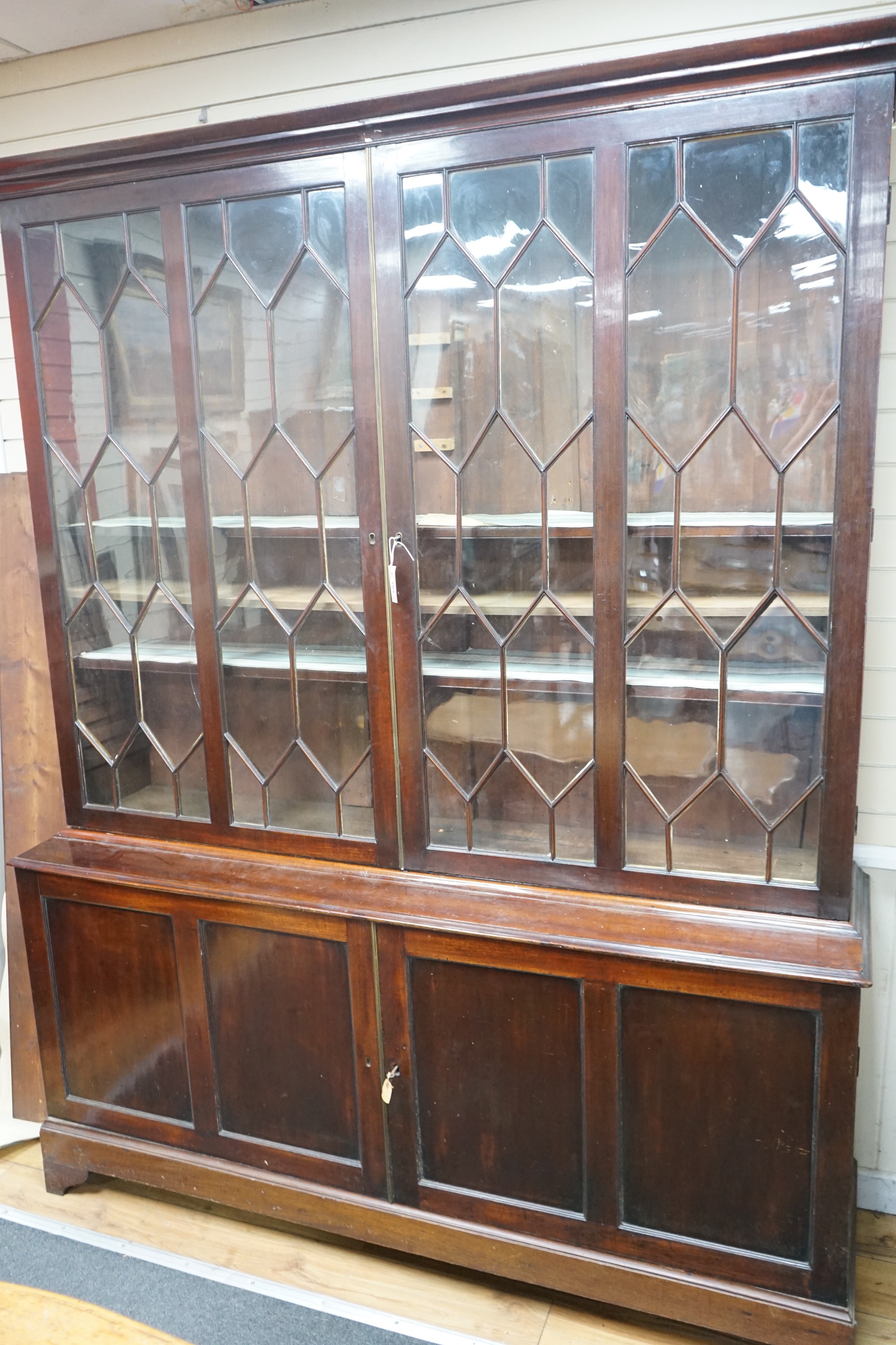 A Victorian mahogany library bookcase, width 182cm, depth 47cm, height 231cm                                                                                                                                                